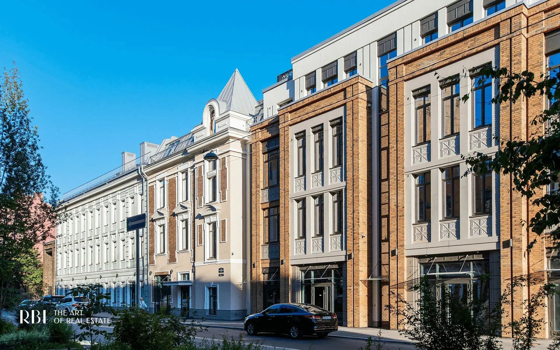 Созидатели на 12-й Красноармейской: старые корпуса и новый дом. Фотография сданного дома