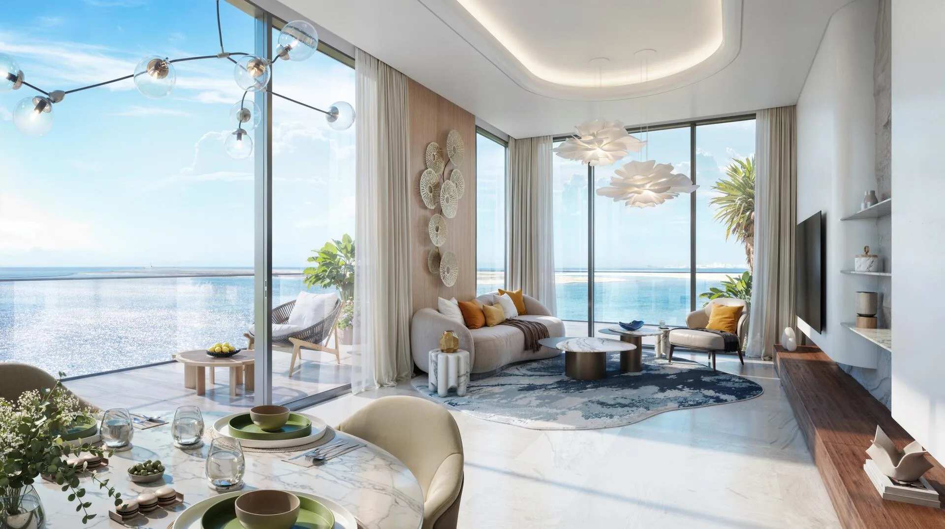 Гостиная квартиры JW Marriott Residences с окнами в пол и видом на море