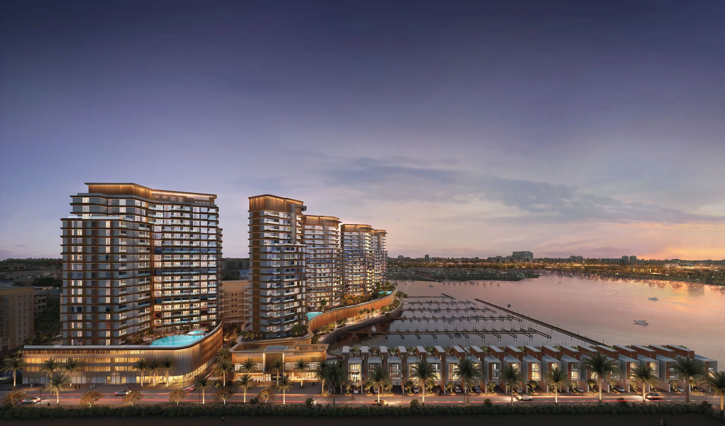 Вечерний вид на Al Hamra Waterfront, марину и таунхаусы
