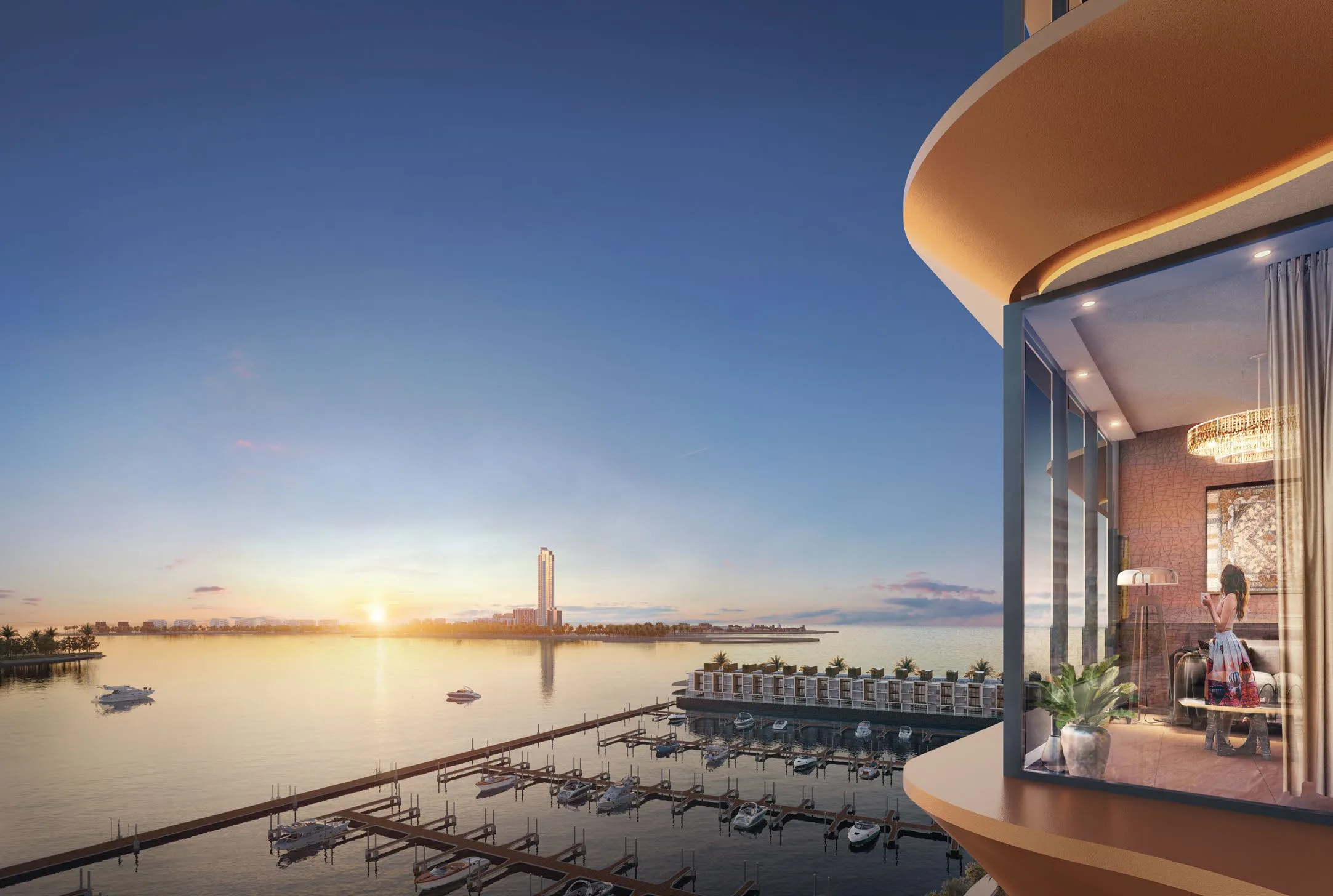 Вид с балкона Al Hamra Waterfront на марину и остров Al Marjan на закате