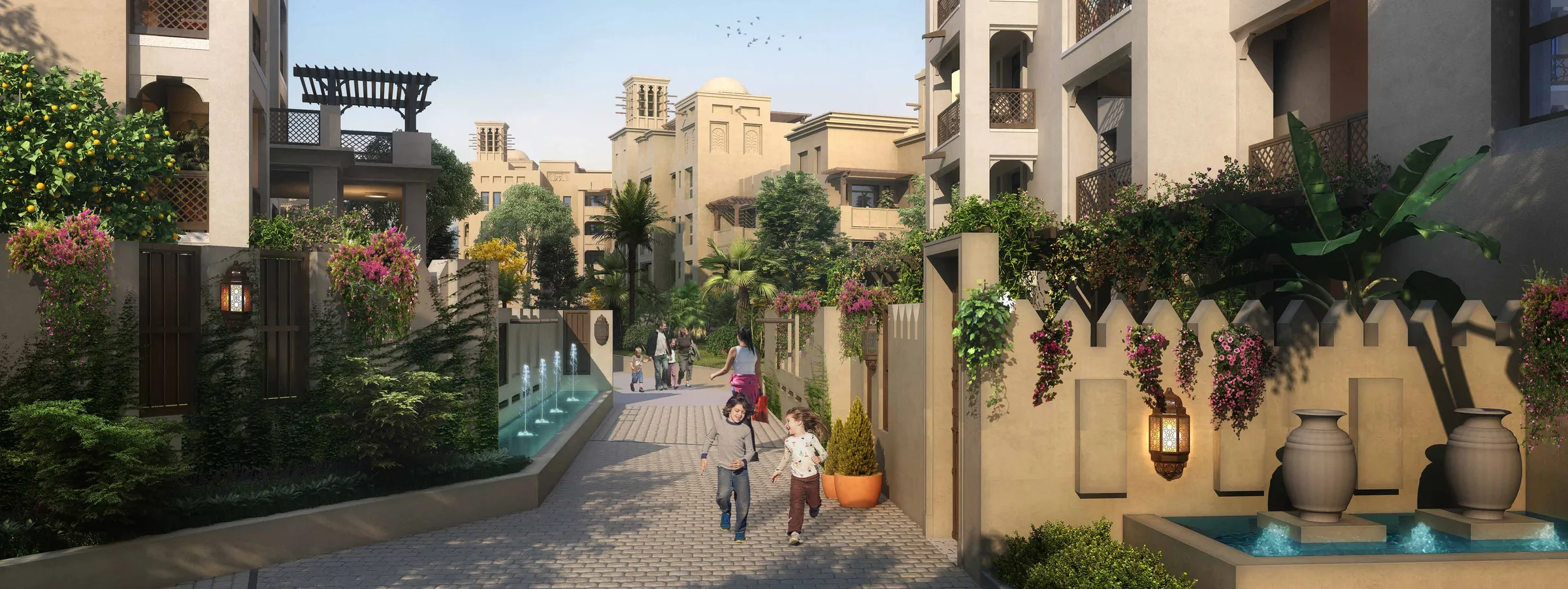 Пешеходная аллея Madinat Jumeirah Living с фонтанами и цветами