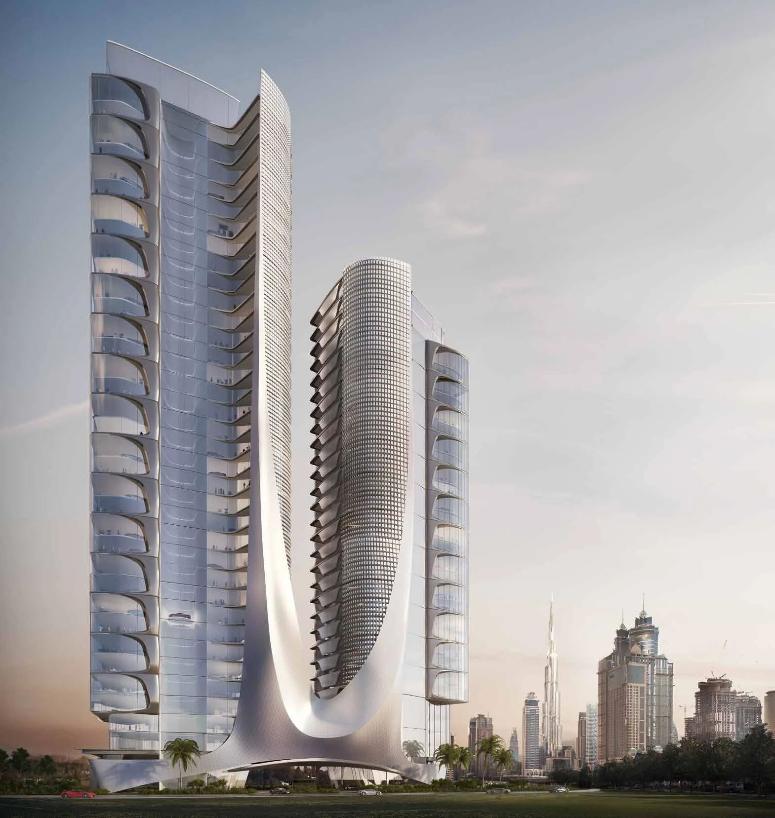Западные башни AYKON City с изогнутыми фасадами, вдали Бурдж-Халифа