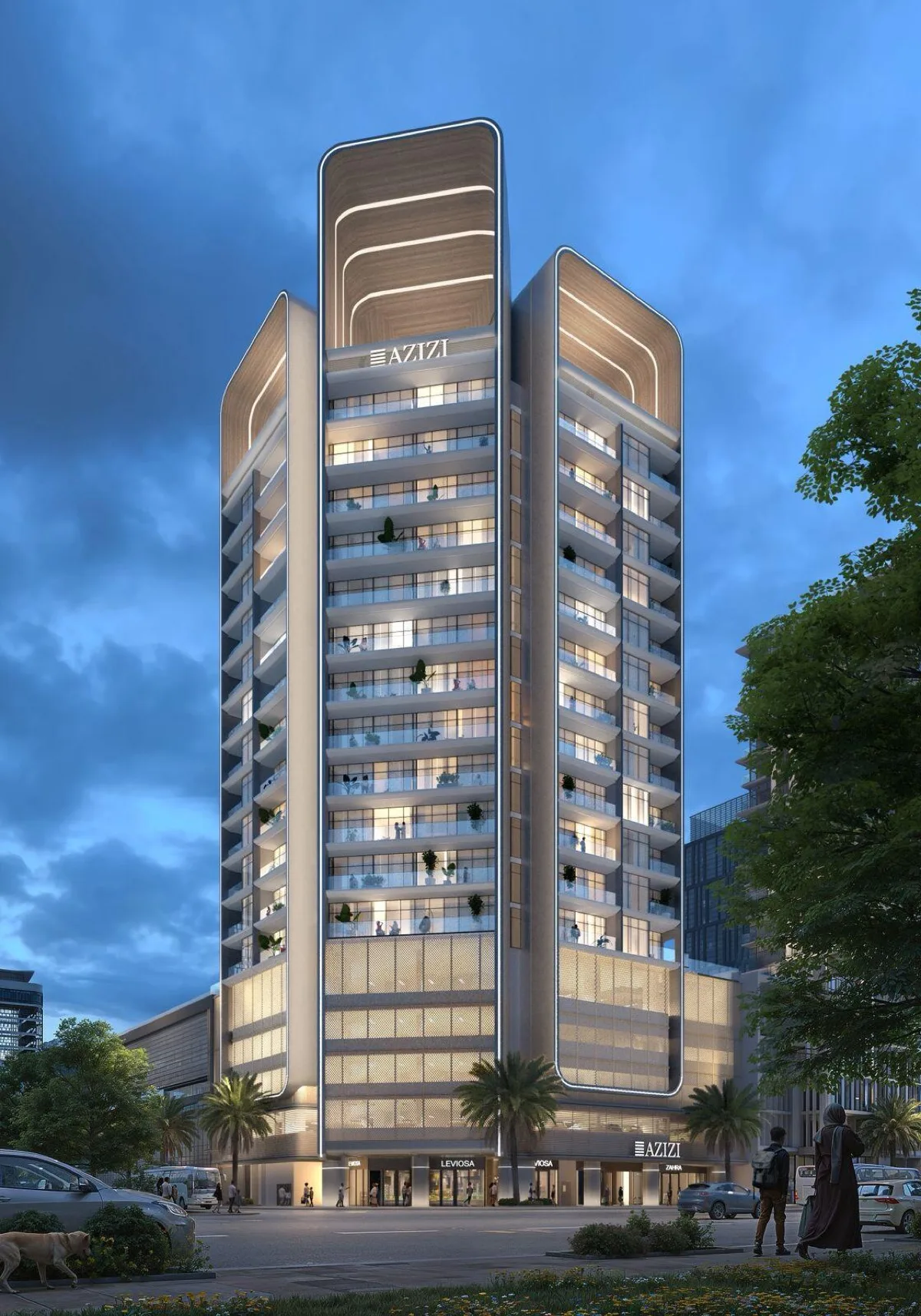 Фасад Azizi Creek Views 4 в сумерках: свет в окнах и торговый этаж внизу
