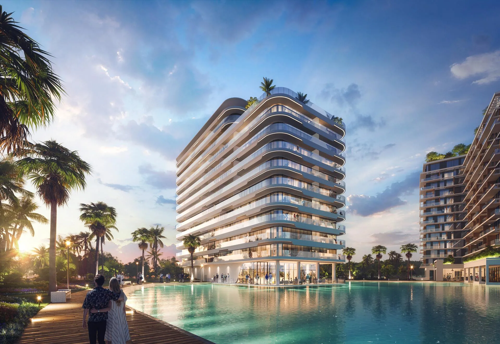 Корпус Azizi Venice у лагуны на закате