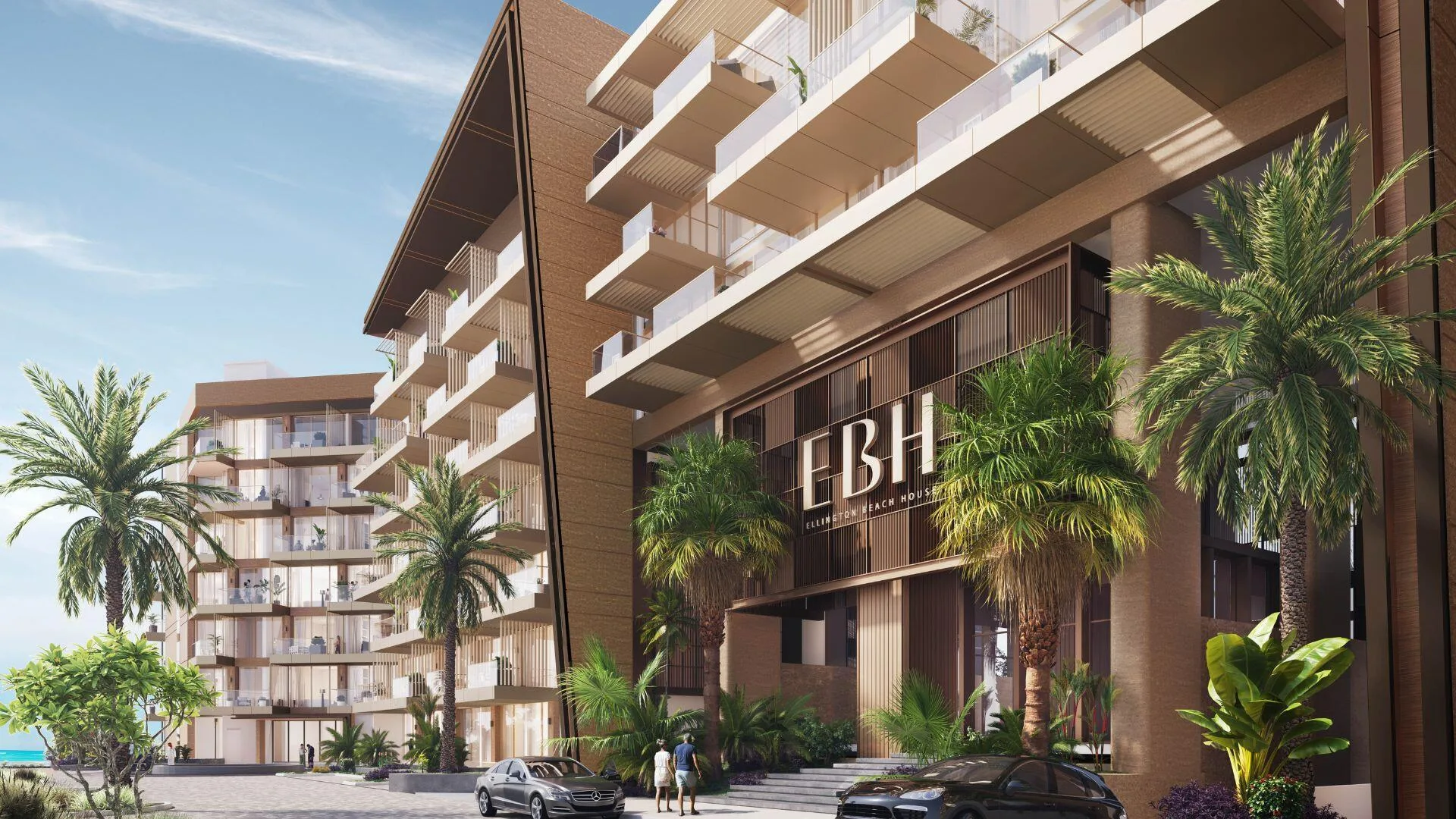Главный вход Ellington Beach House с буквами EBH и подъездной дорожкой