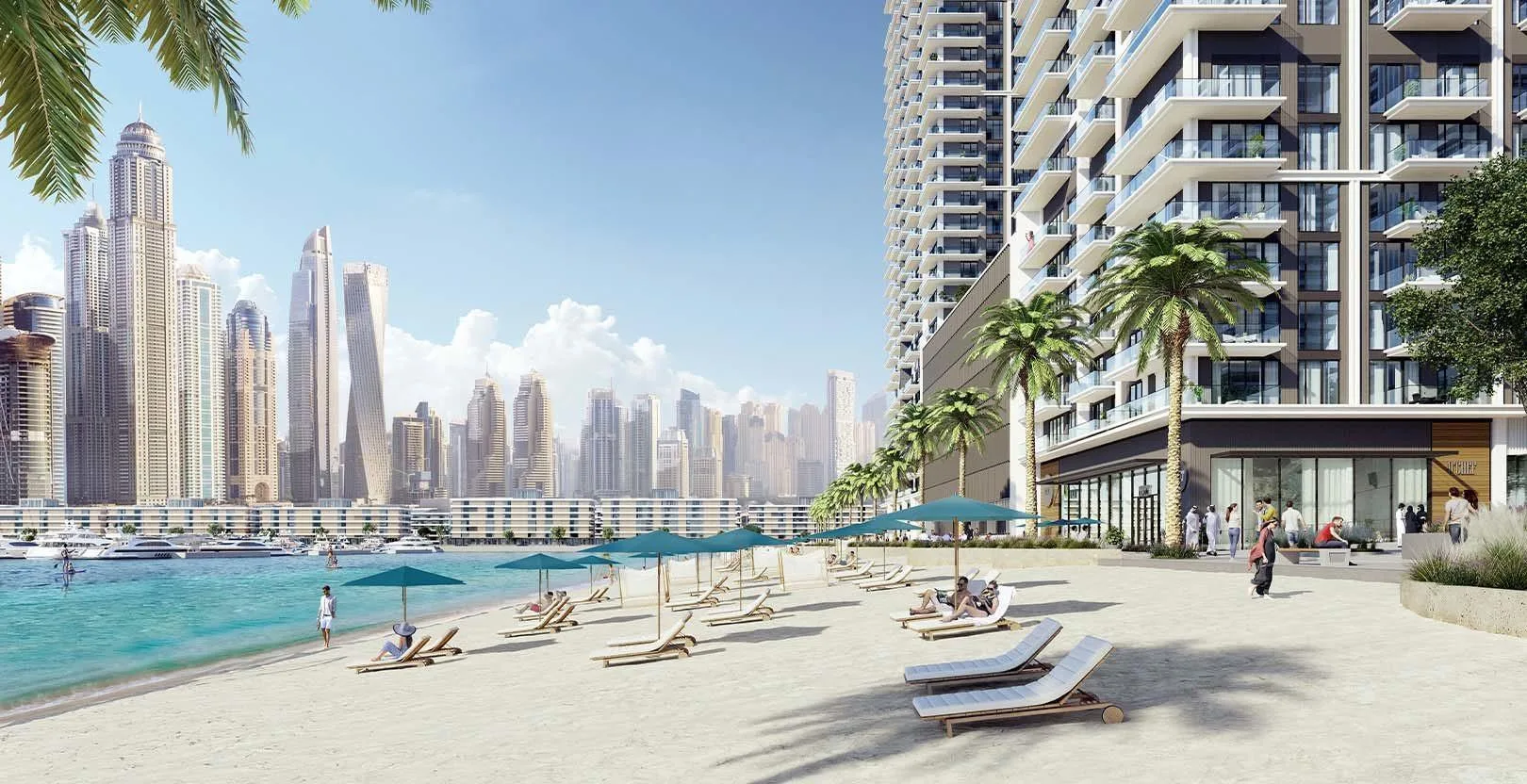 Пляж у подножия Beach Mansion с лежаками и видом на Dubai Marina