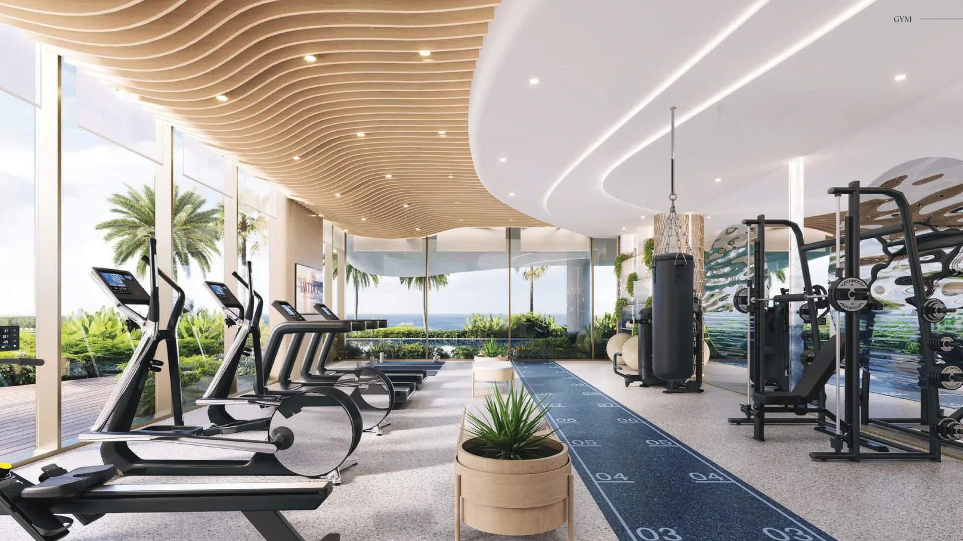 Спортзал Beach Walk Grand 2 с тренажёрами и окнами в пол