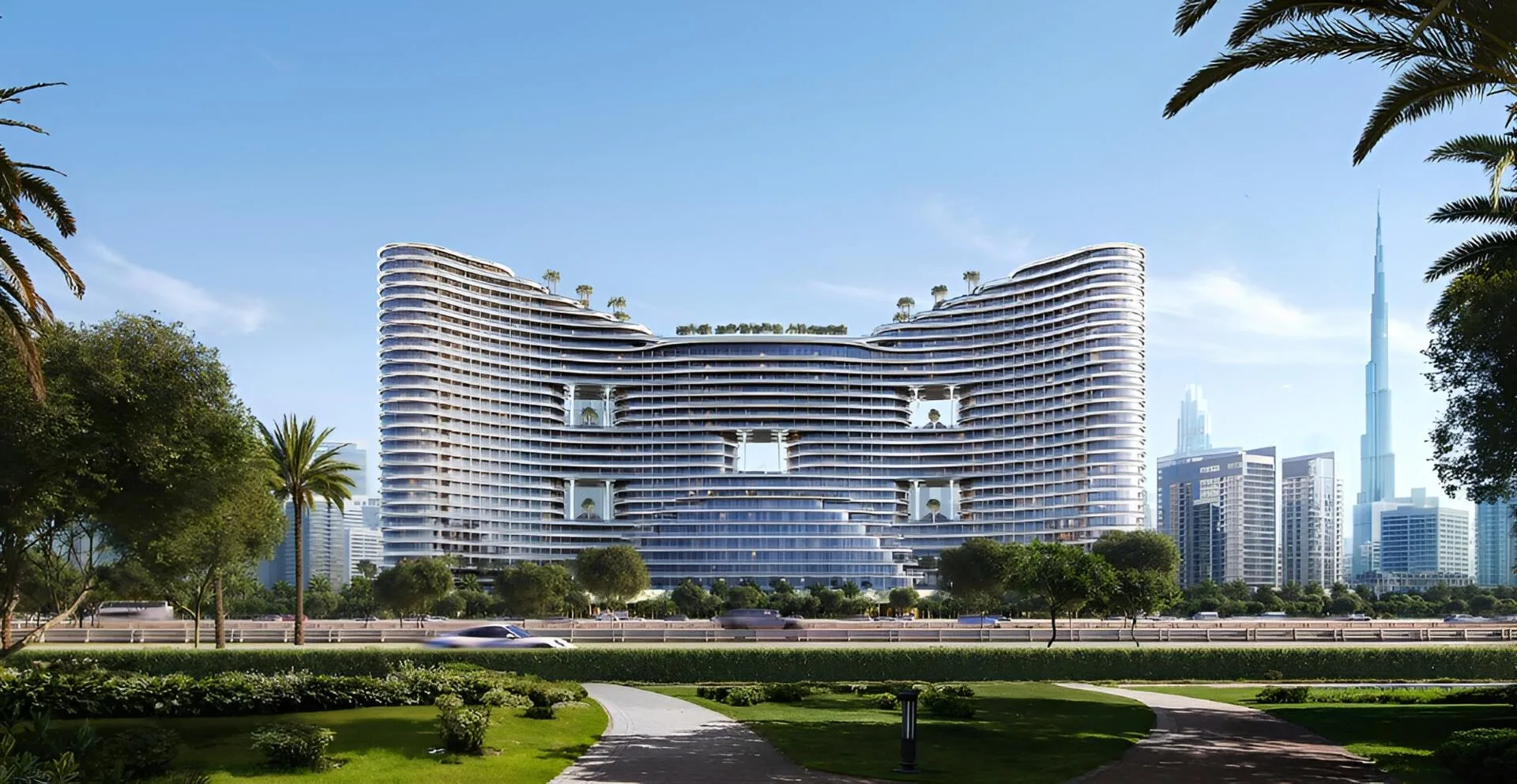 Дом Binghatti Aquarise днём со стороны парка, справа Burj Khalifa