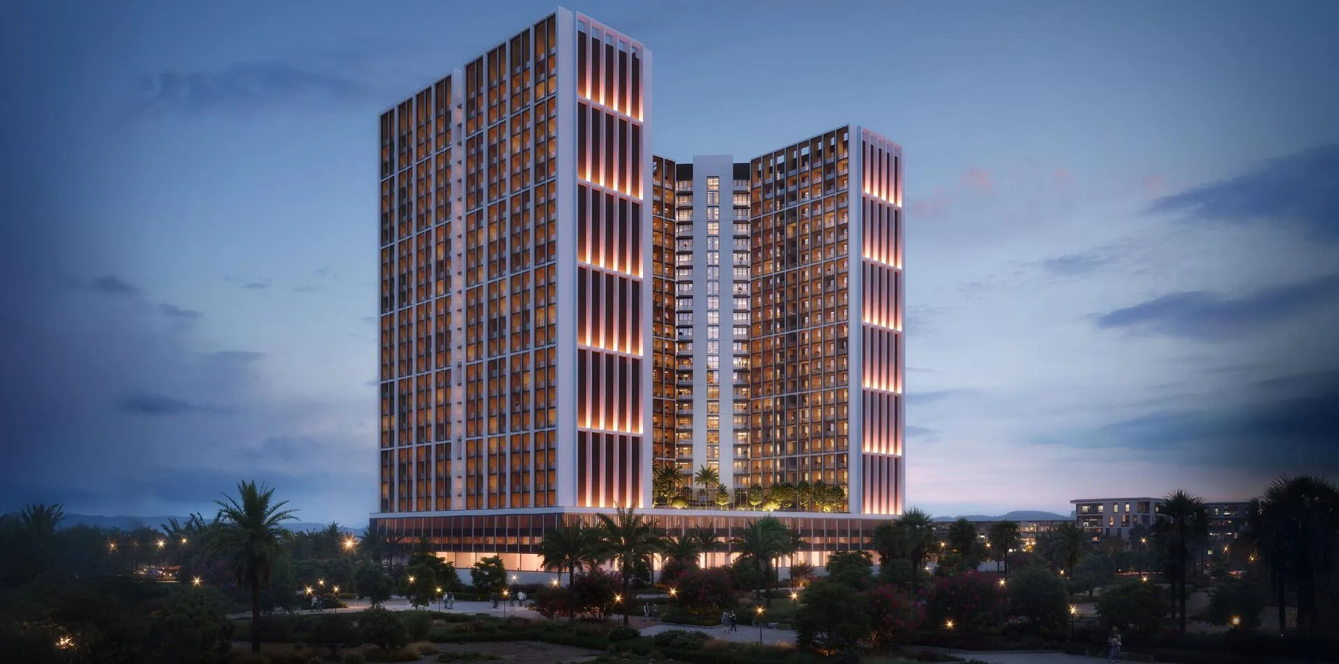 Binghatti Elite ночью: подсветка вдоль вертикальных рам фасада