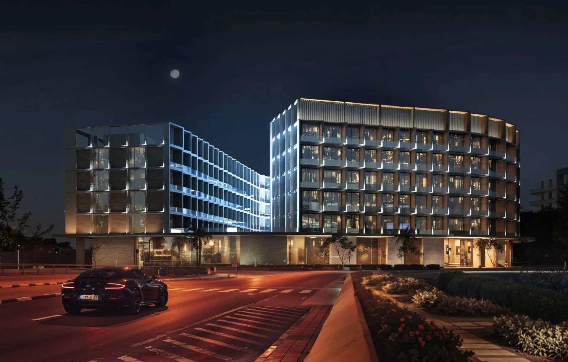 Binghatti Hillcrest вечером со стороны улицы