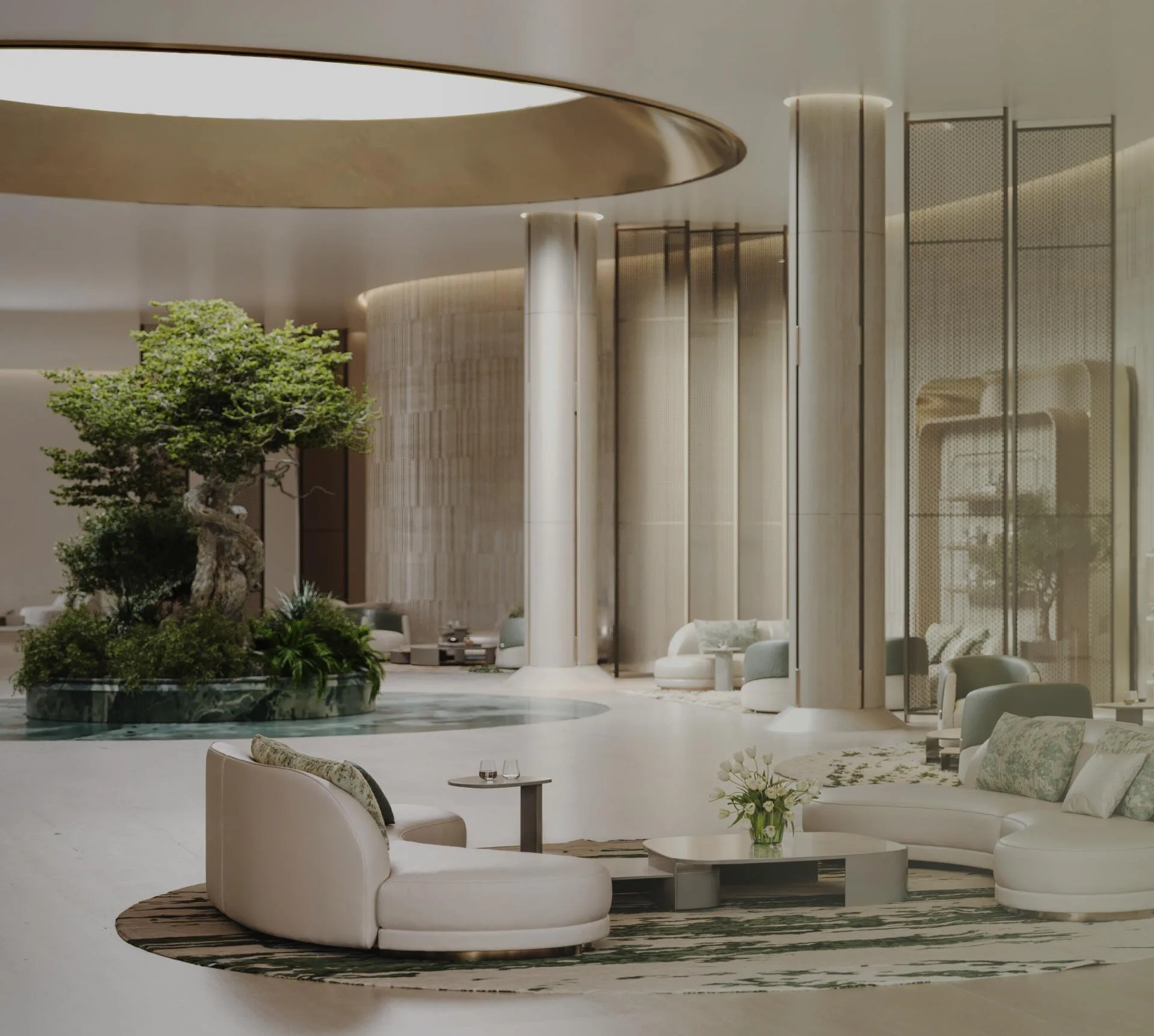 Лобби Binghatti Hillcrest: дерево в круглой клумбе и диваны