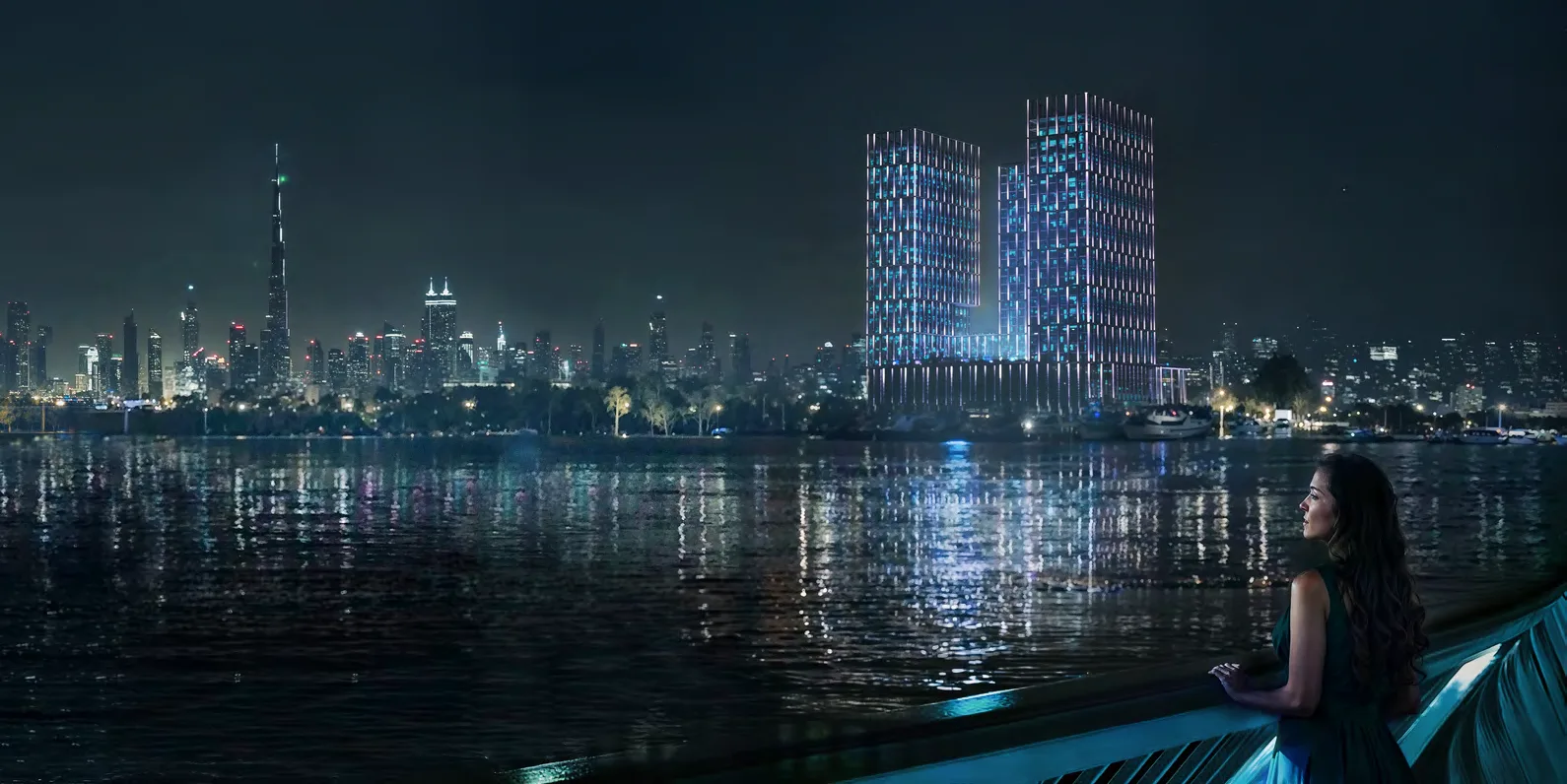 Ночной вид на подсвеченные башни Binghatti Spectre через воду Dubai Creek