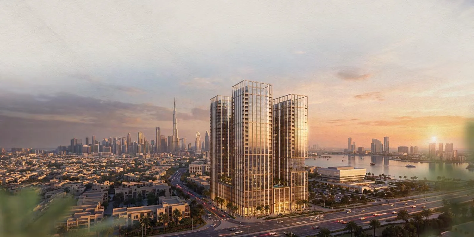 Binghatti Spectre на закате: слева Downtown, справа залив Dubai Creek
