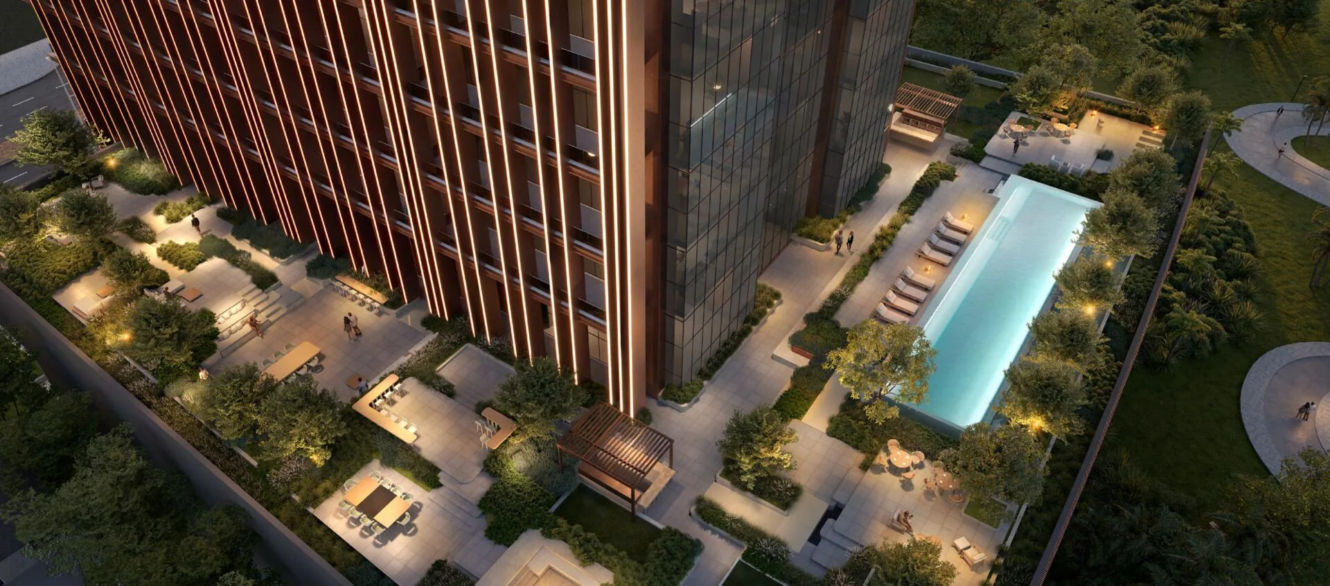 Сад и бассейн на подиуме Burj Capital вечером