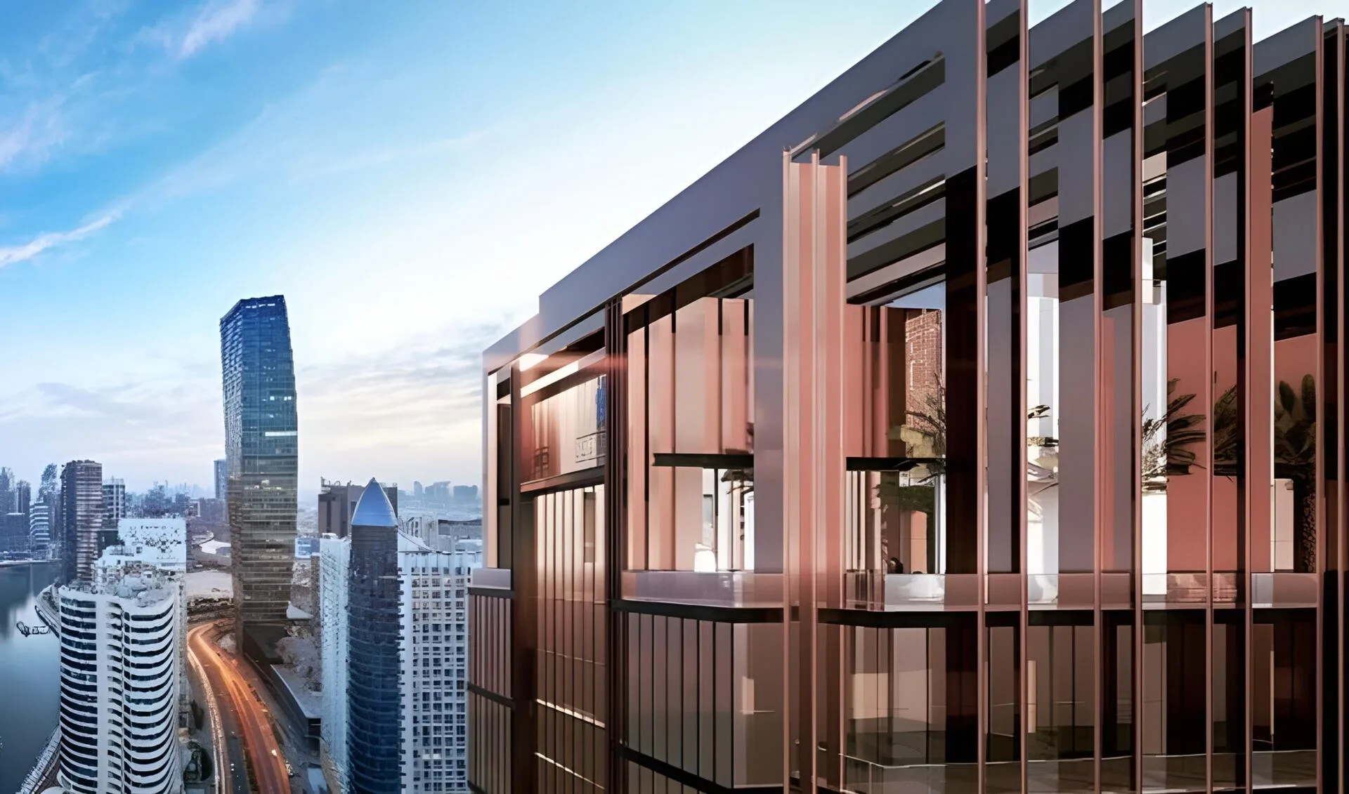 Верх башни Burj Capital: бронзовые рёбра на фоне Business Bay