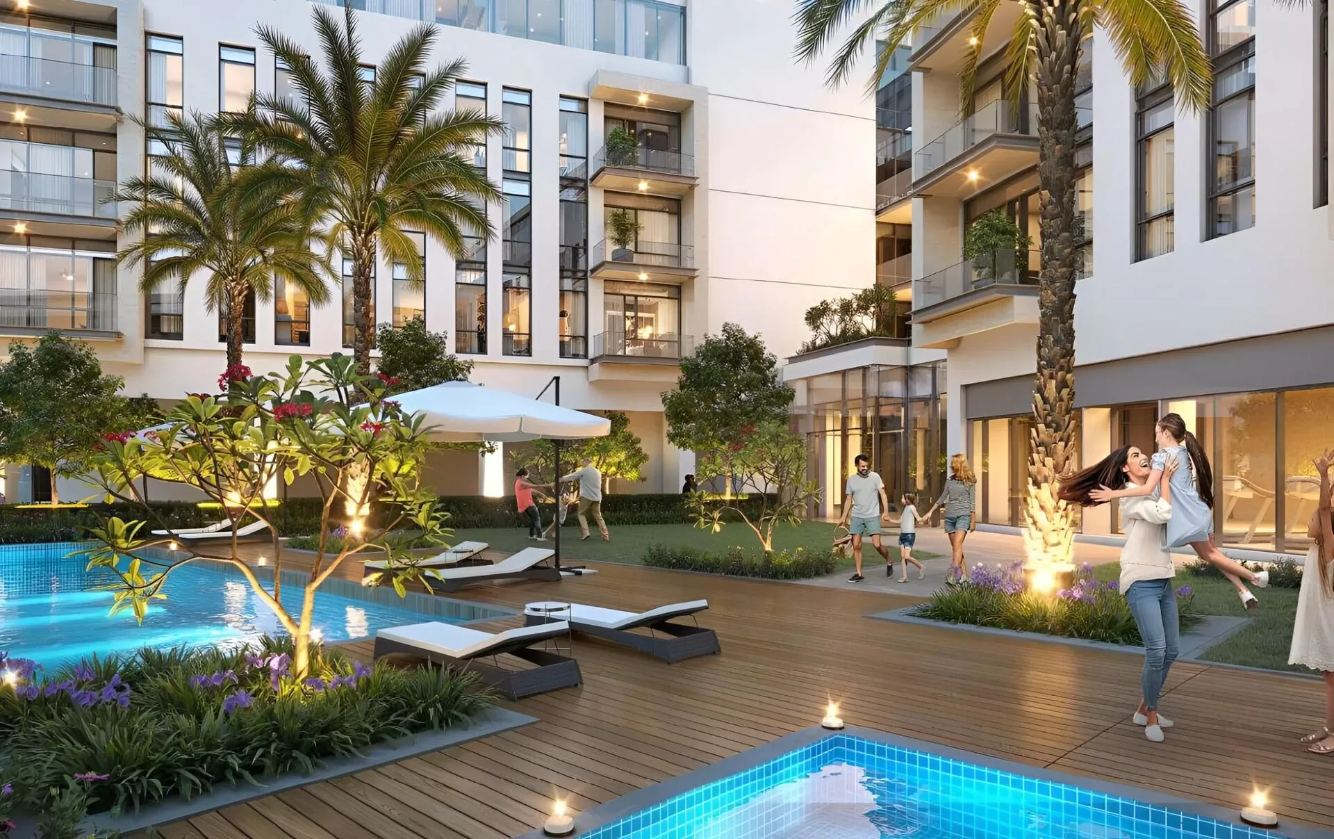 Двор с бассейном и садом между домами Canal Front Residences