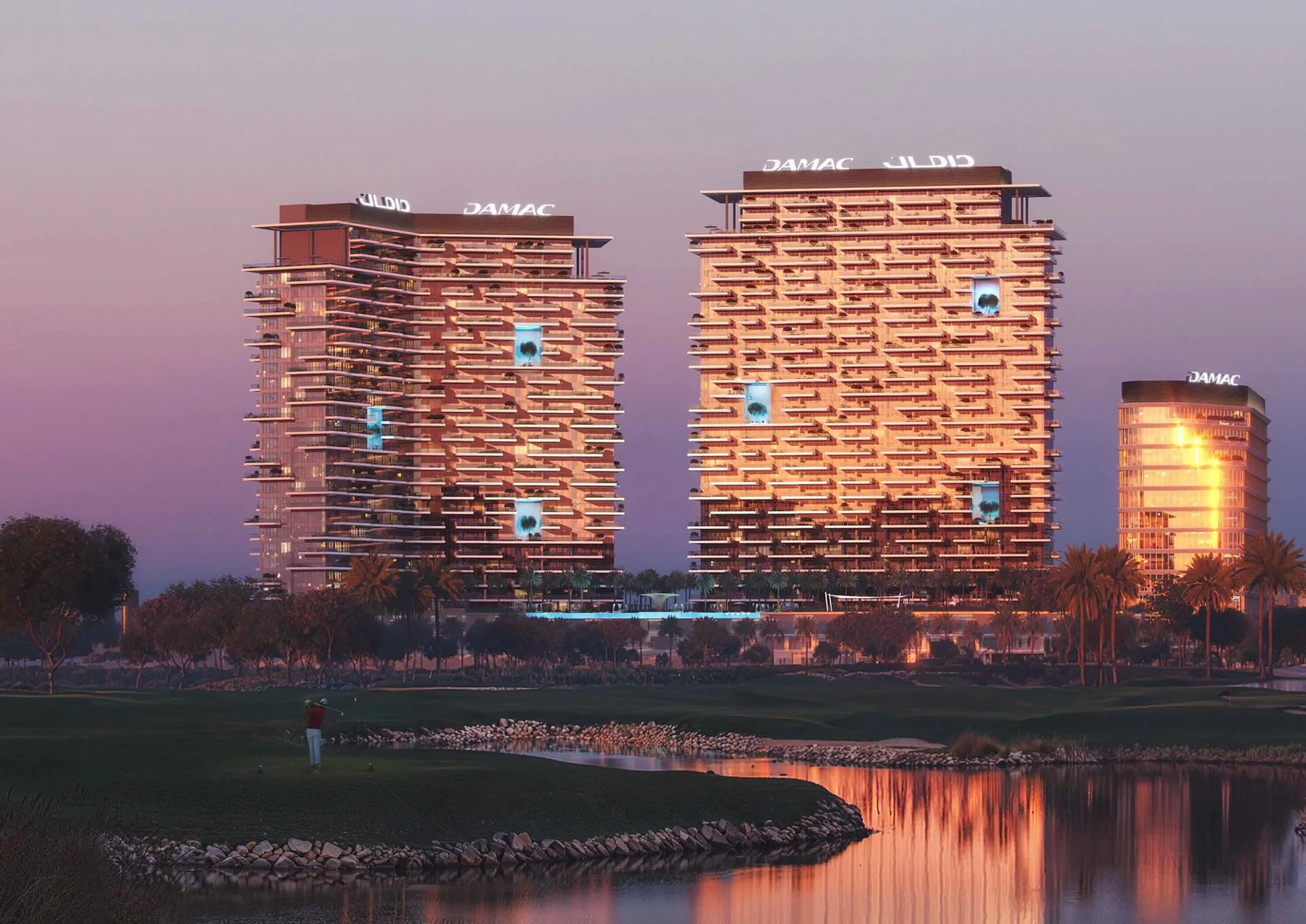 Башни Damac District у воды вечером