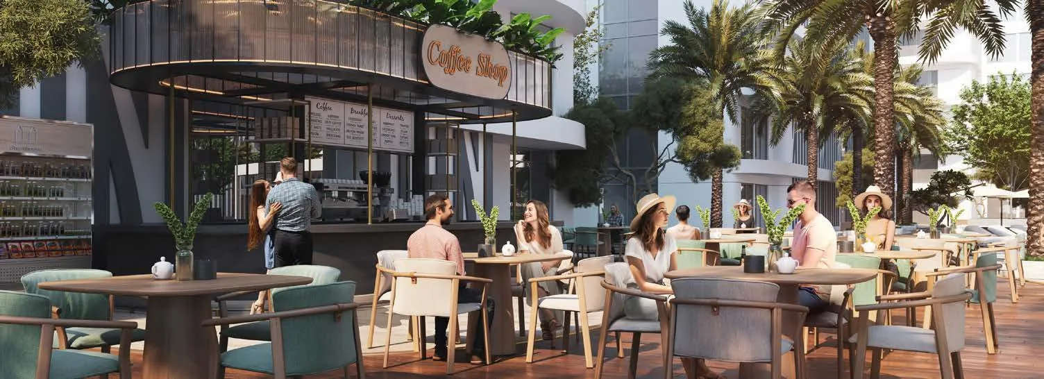 Уличная кофейня в Damac Lagoon Views, гости за столиками