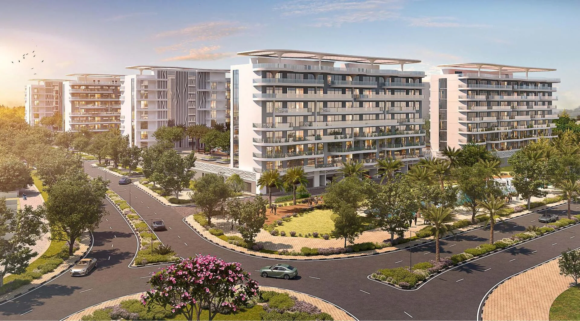 Улица у корпусов Damac Lagoon Views с круговым движением и газонами