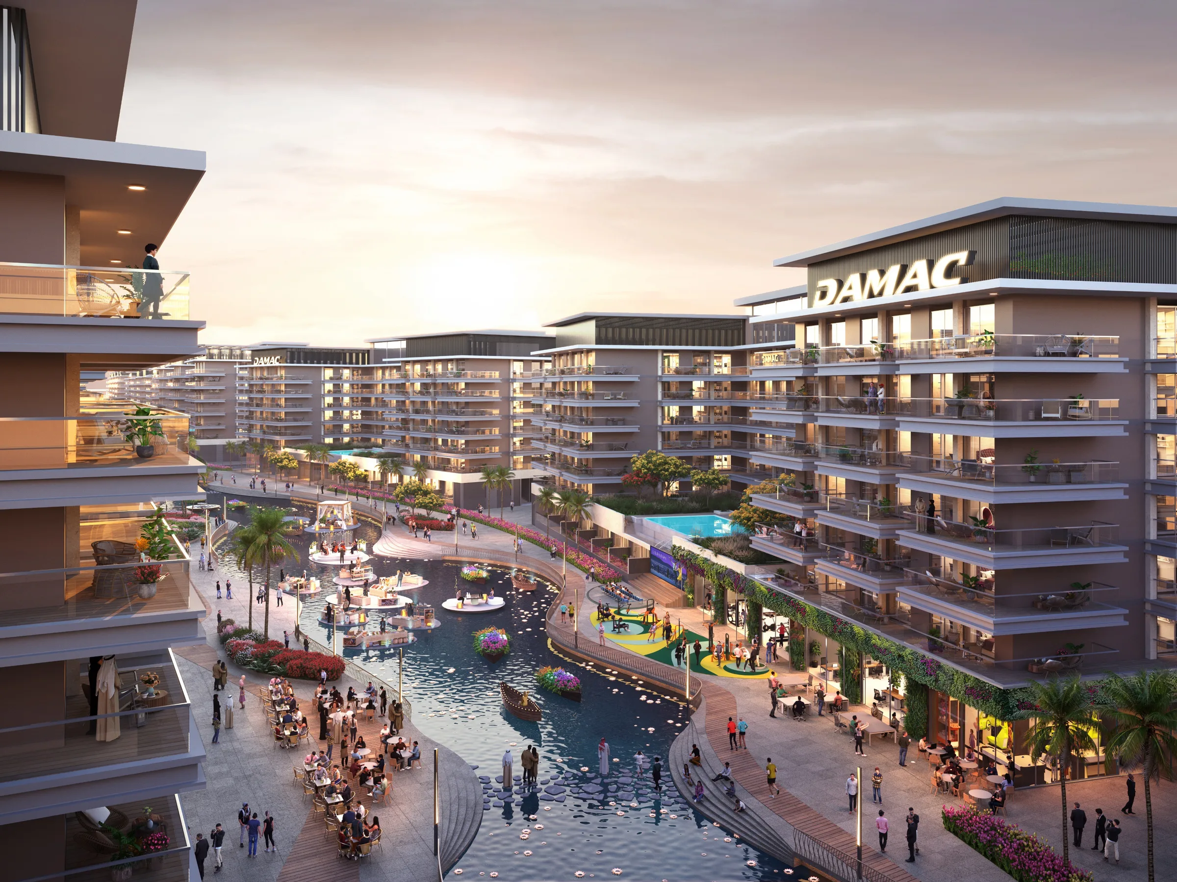 Канал Riverside Views на закате: набережная, кафе и дома DAMAC