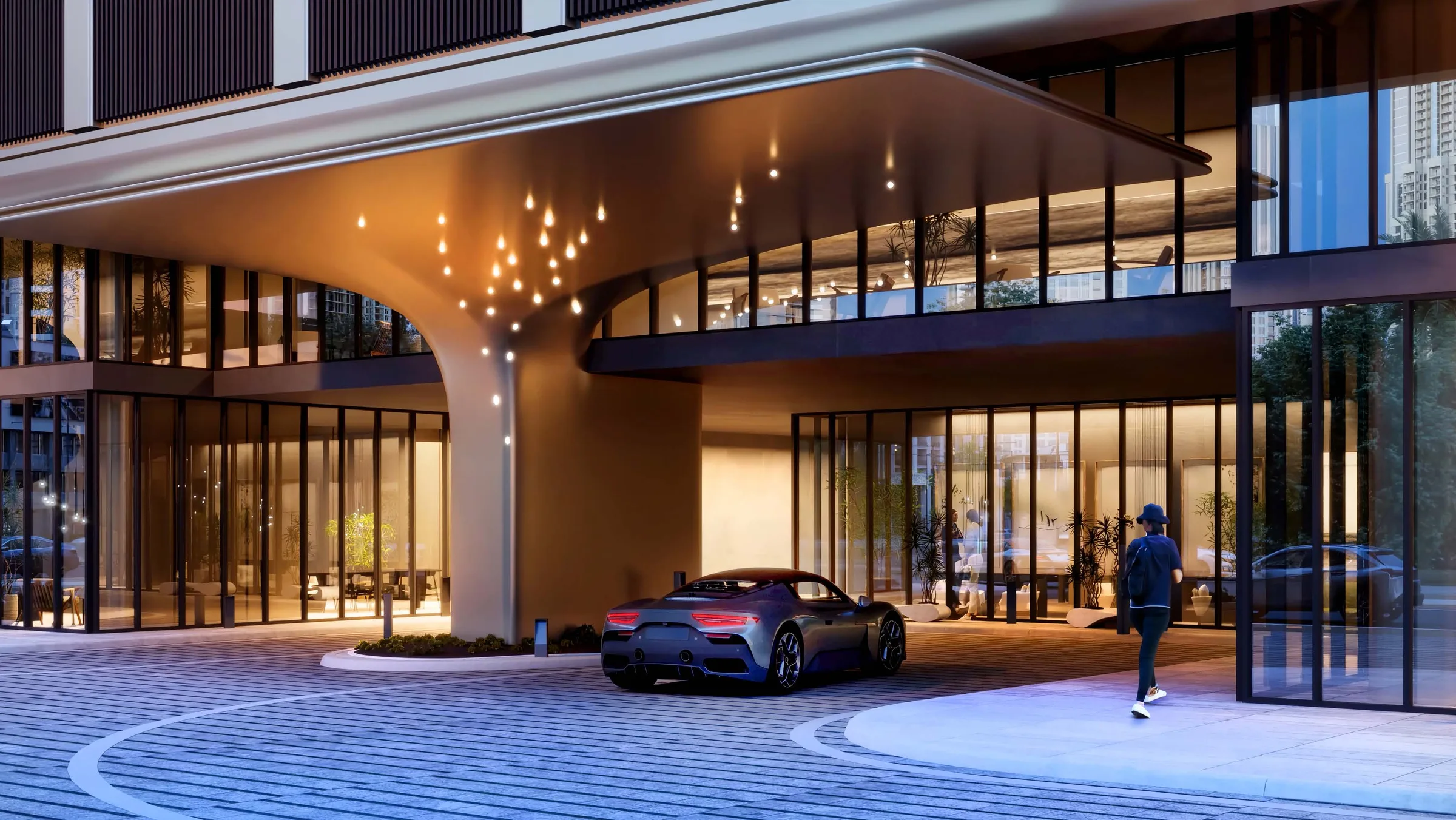 Крытый подъезд porte cochère у главного входа вечером