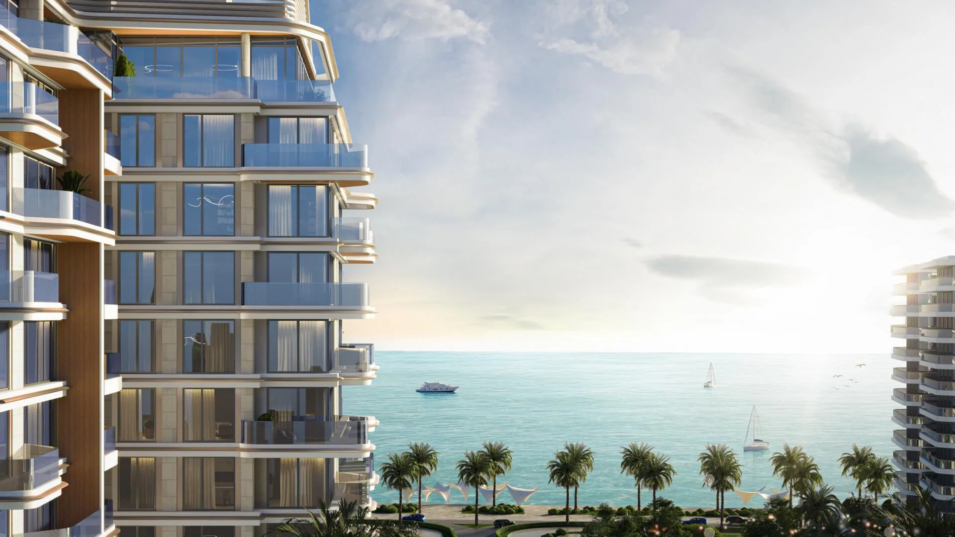 Дом Edgewater Residences и вид на море с пальмами вдоль берега