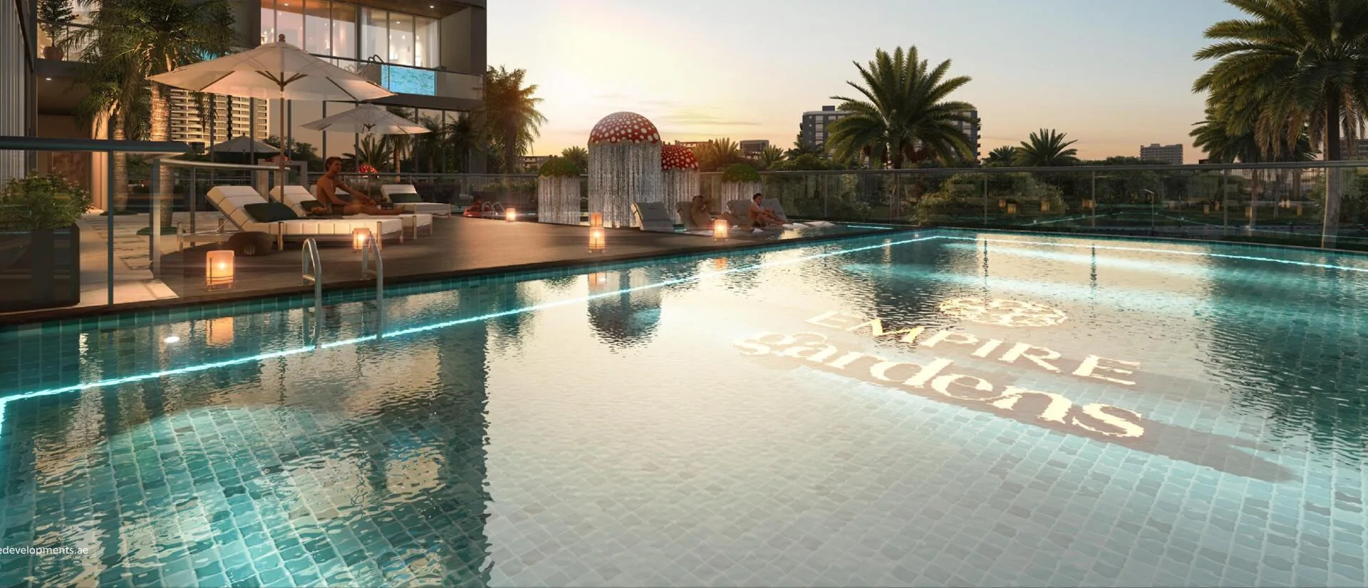 Общий бассейн Empire Gardens с лежаками и зонтами