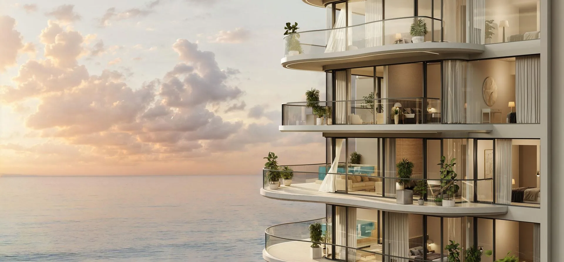 Балконы Esmé Beach Residences над морем на закате