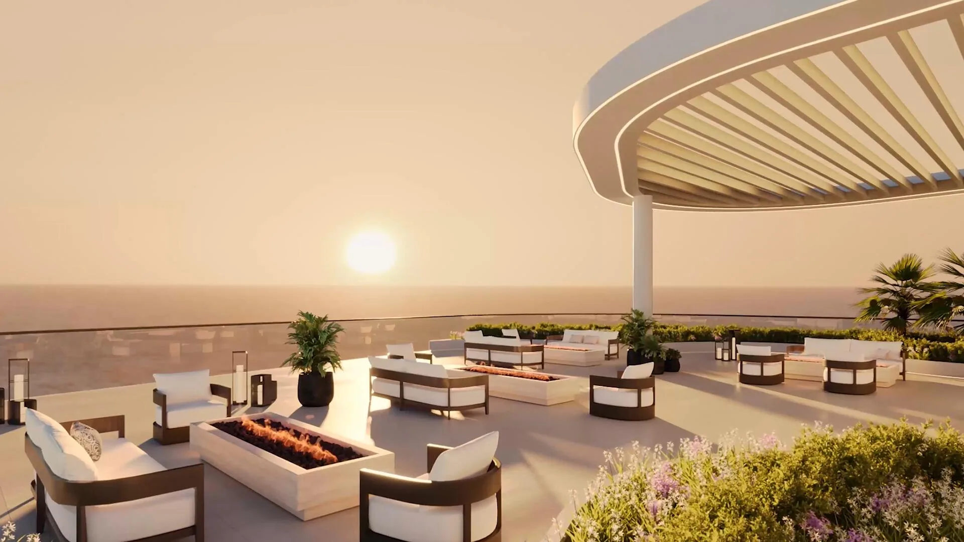 Лаунж на крыше Esmé Beach Residences на закате