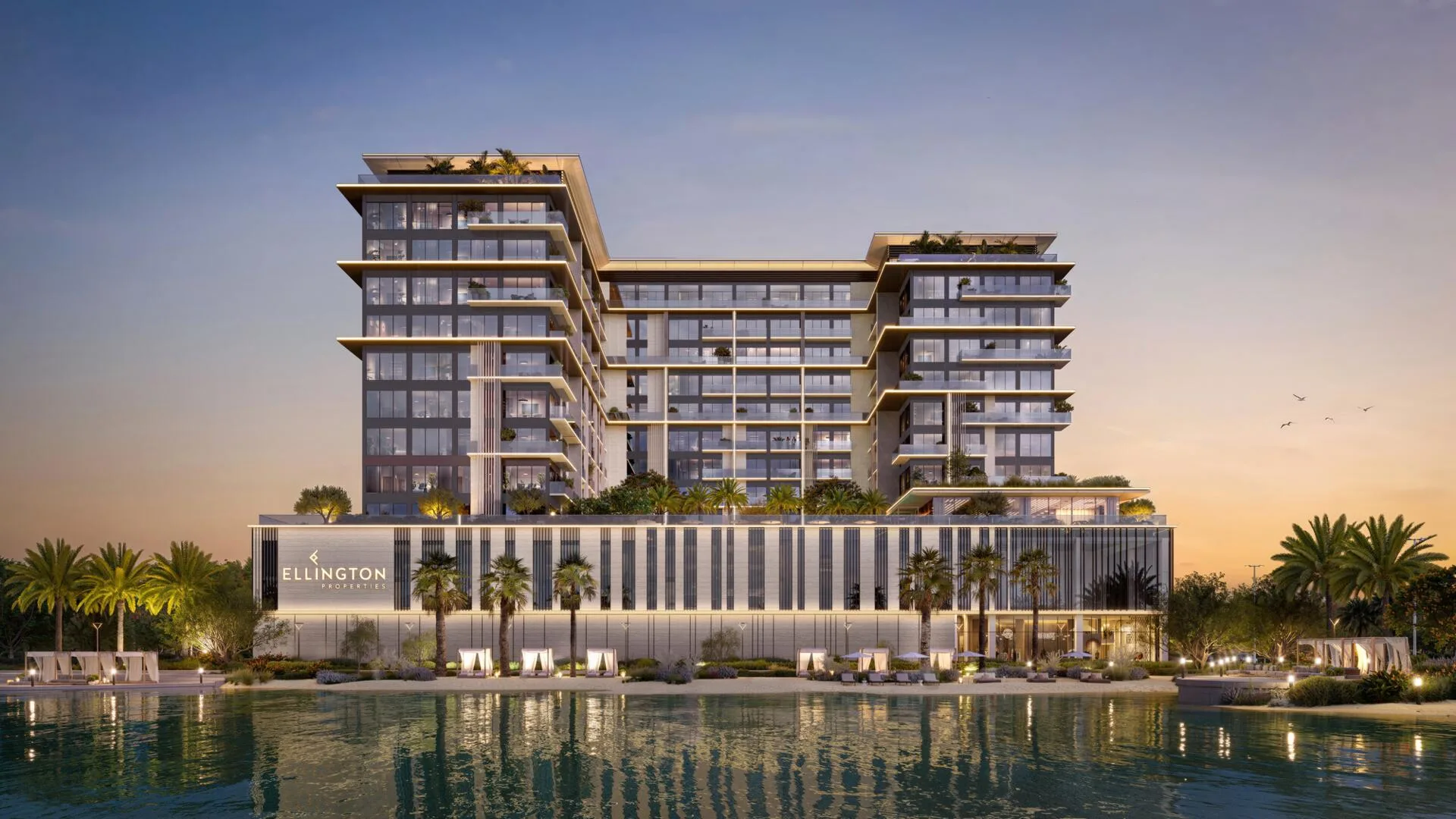 Фасад Everly Place со стороны лагуны в сумерках