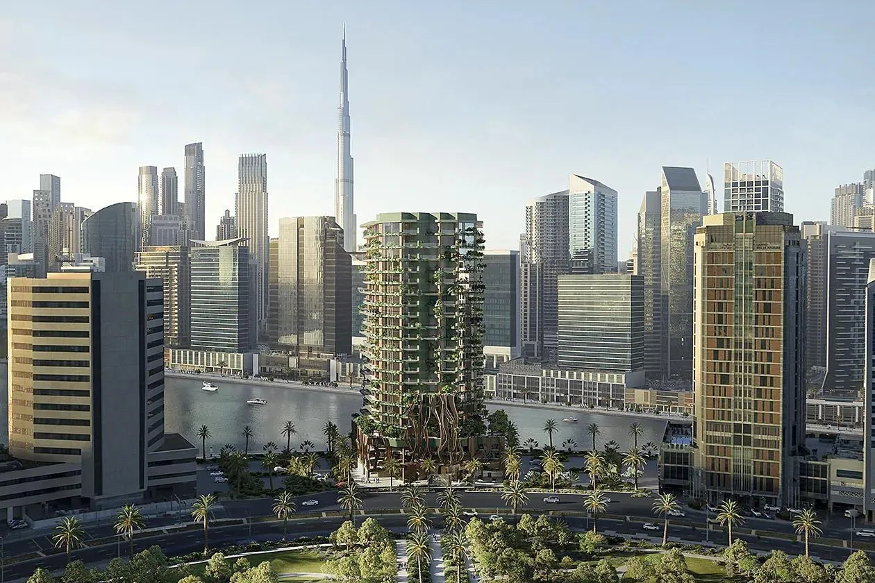 Eywa на берегу Dubai Canal, за ней Burj Khalifa