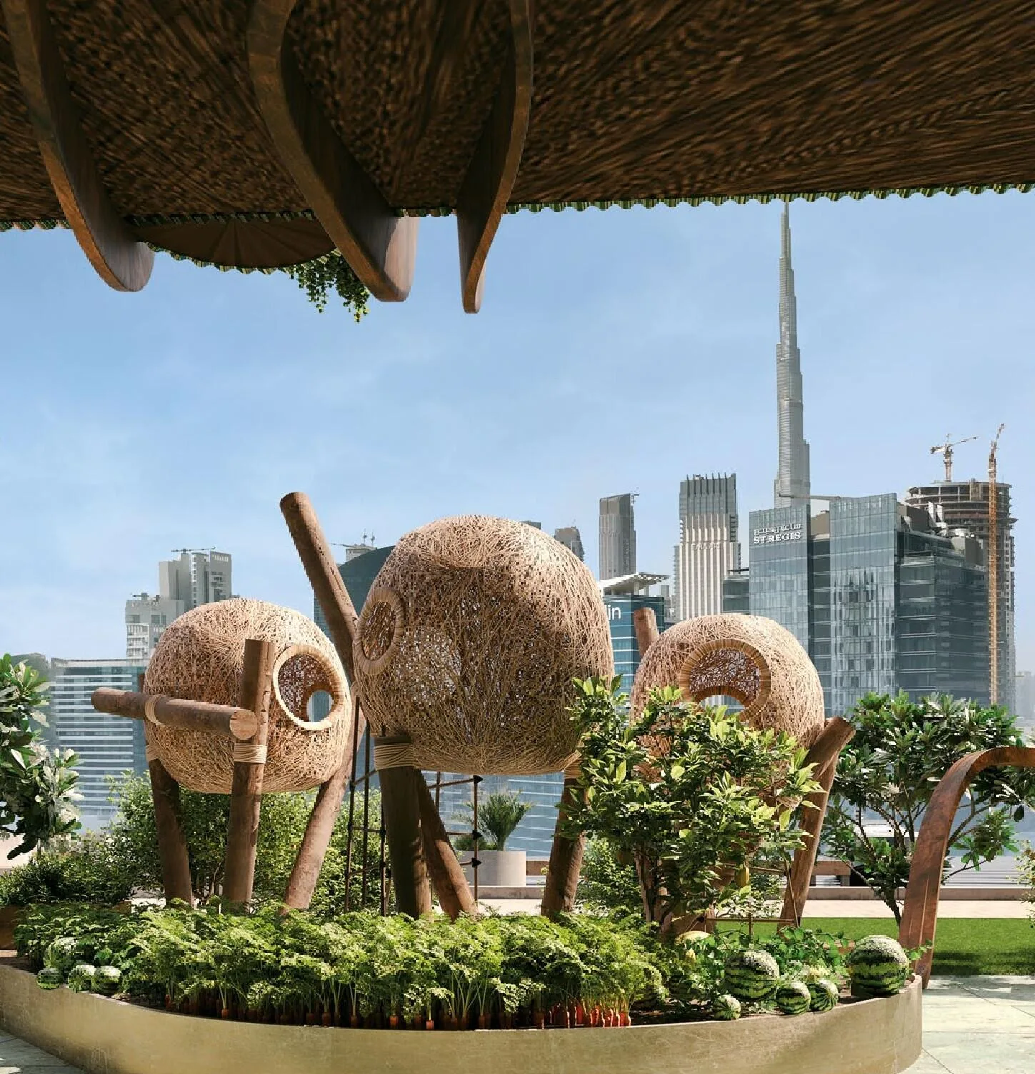 Плетёные гнёзда в саду на террасе Eywa на фоне Burj Khalifa