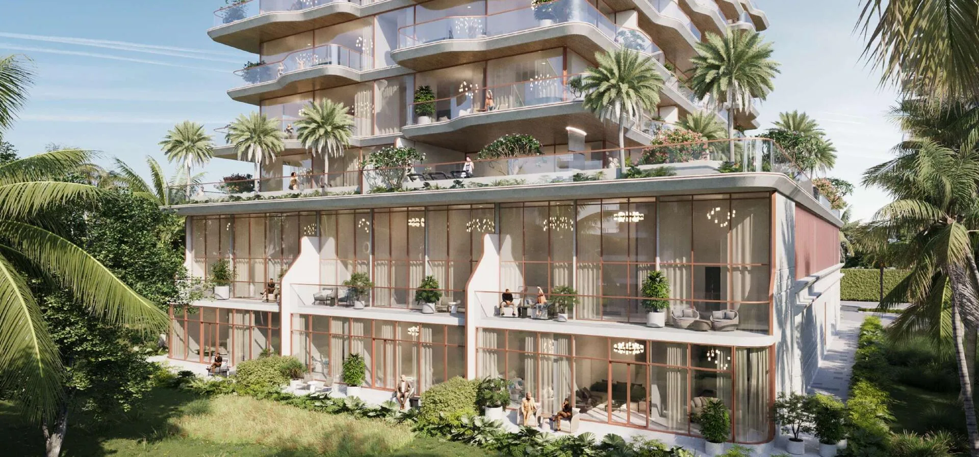 Нижние этажи Flow Residences среди пальм и зелени