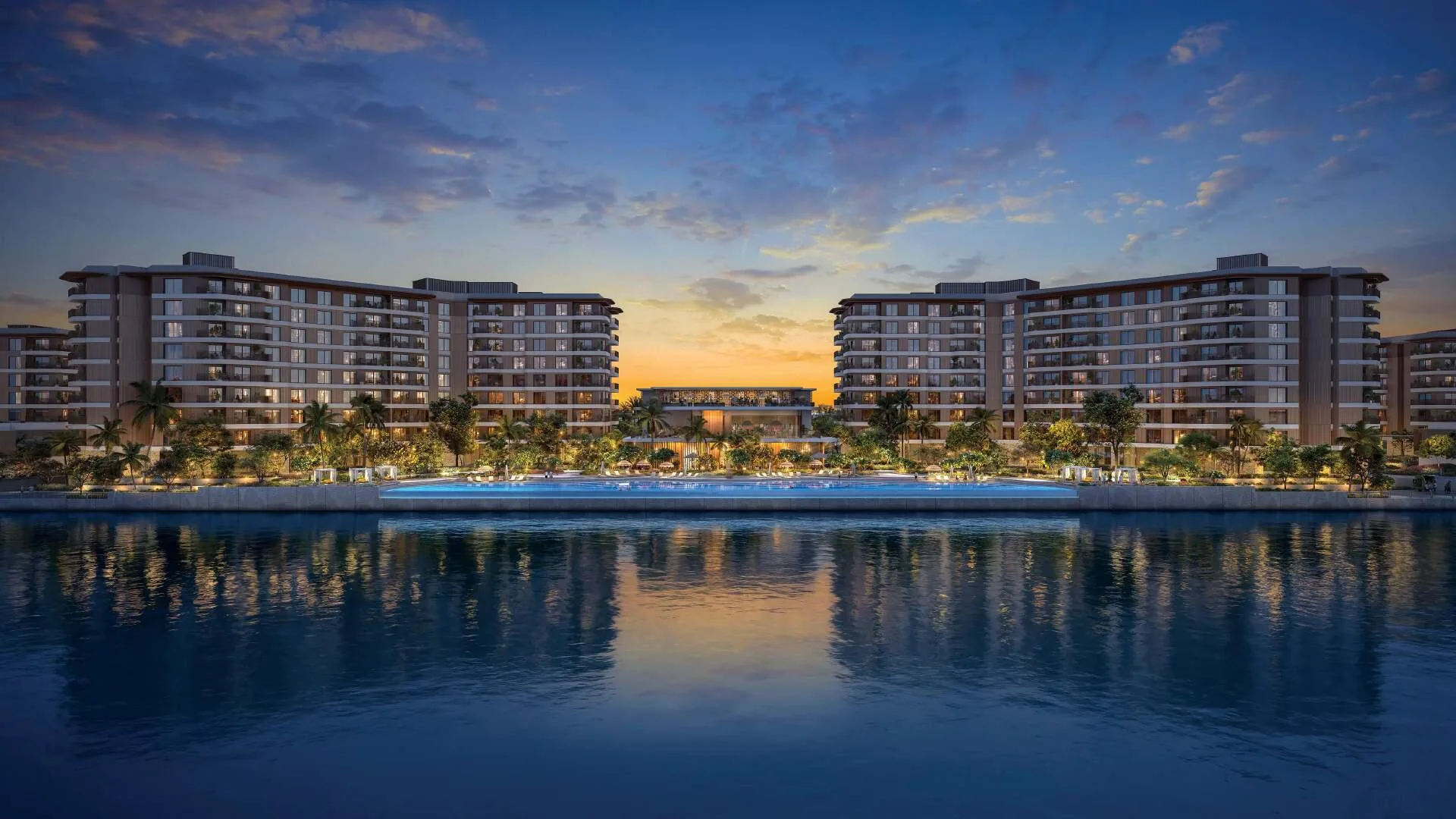 Дома Gardenia Bay у воды на закате