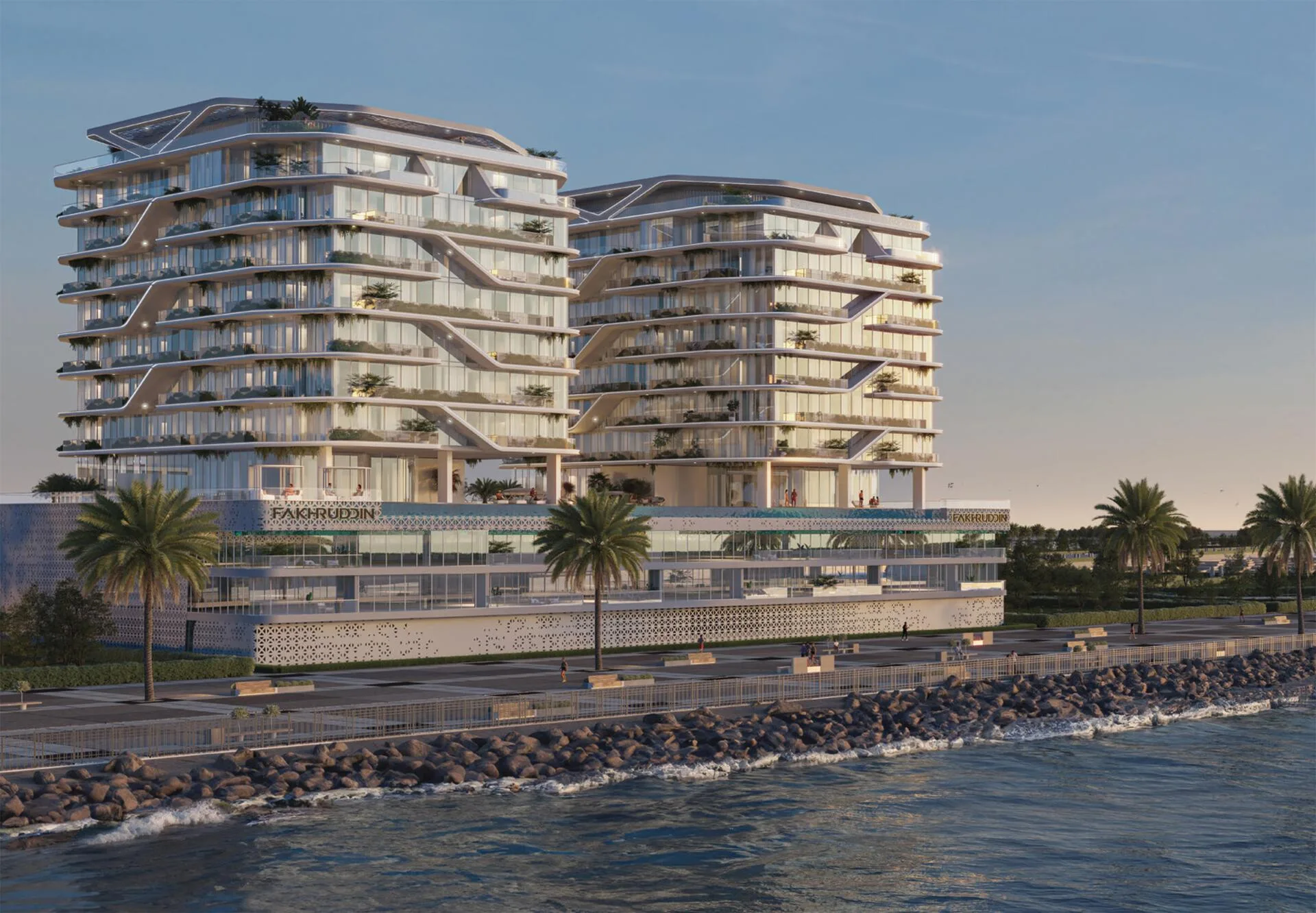 Башни Hatimi Residences над морем в вечернем свете