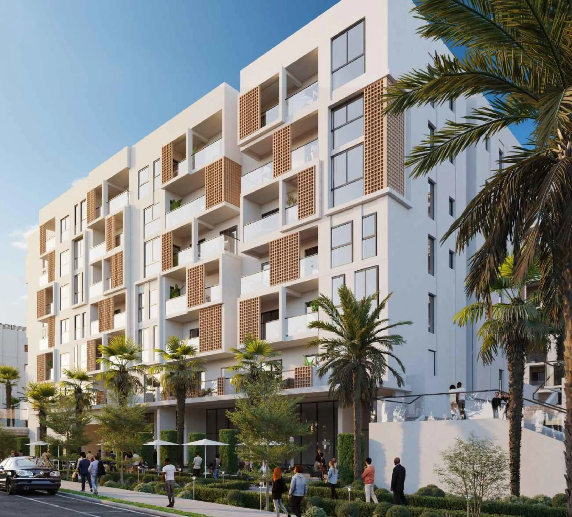 Светлый фасад Hillside Residences с деревянными ширмами и пальмами