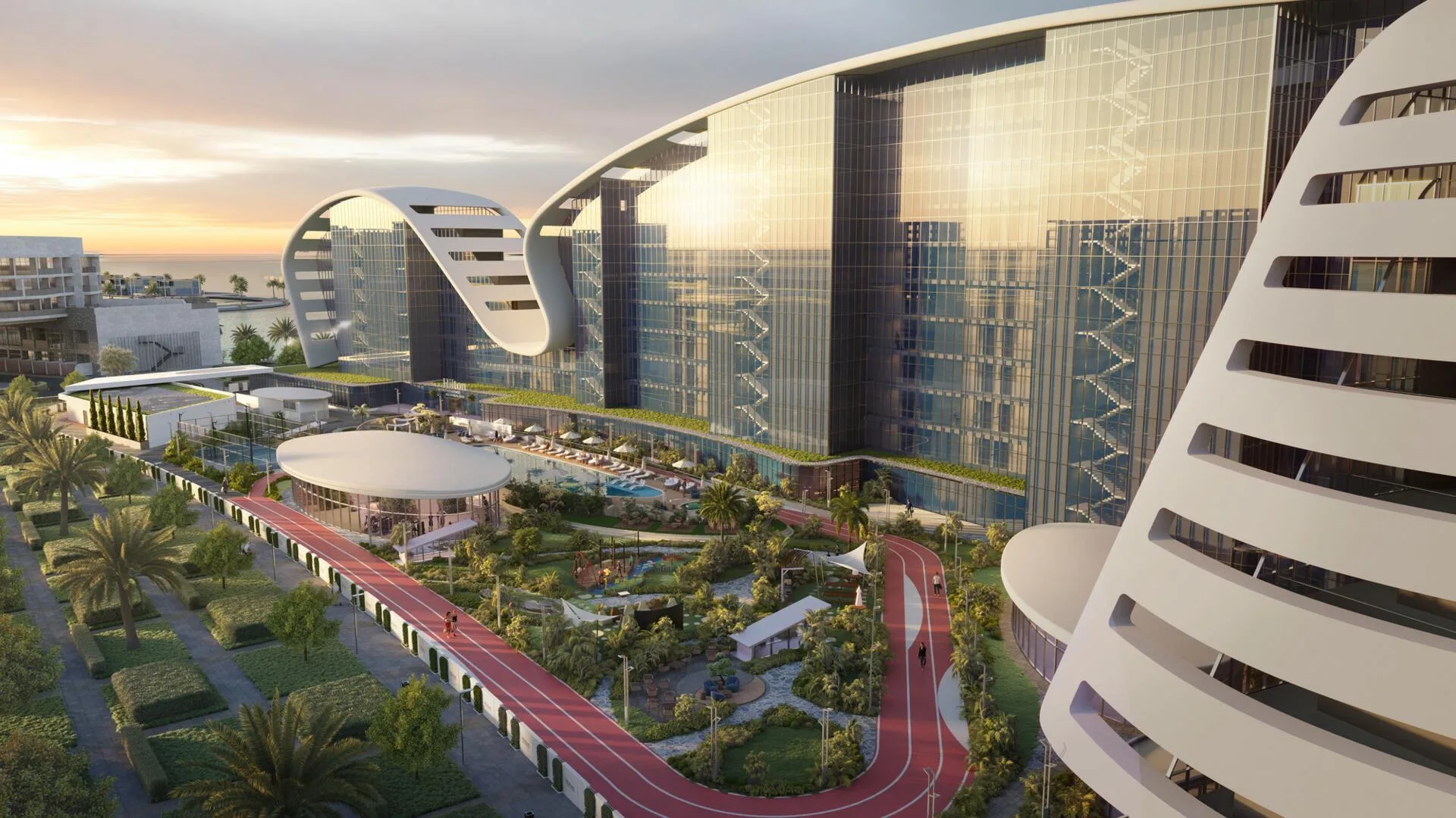 Двор Hilton Residences: зелень, дорожки и бассейн