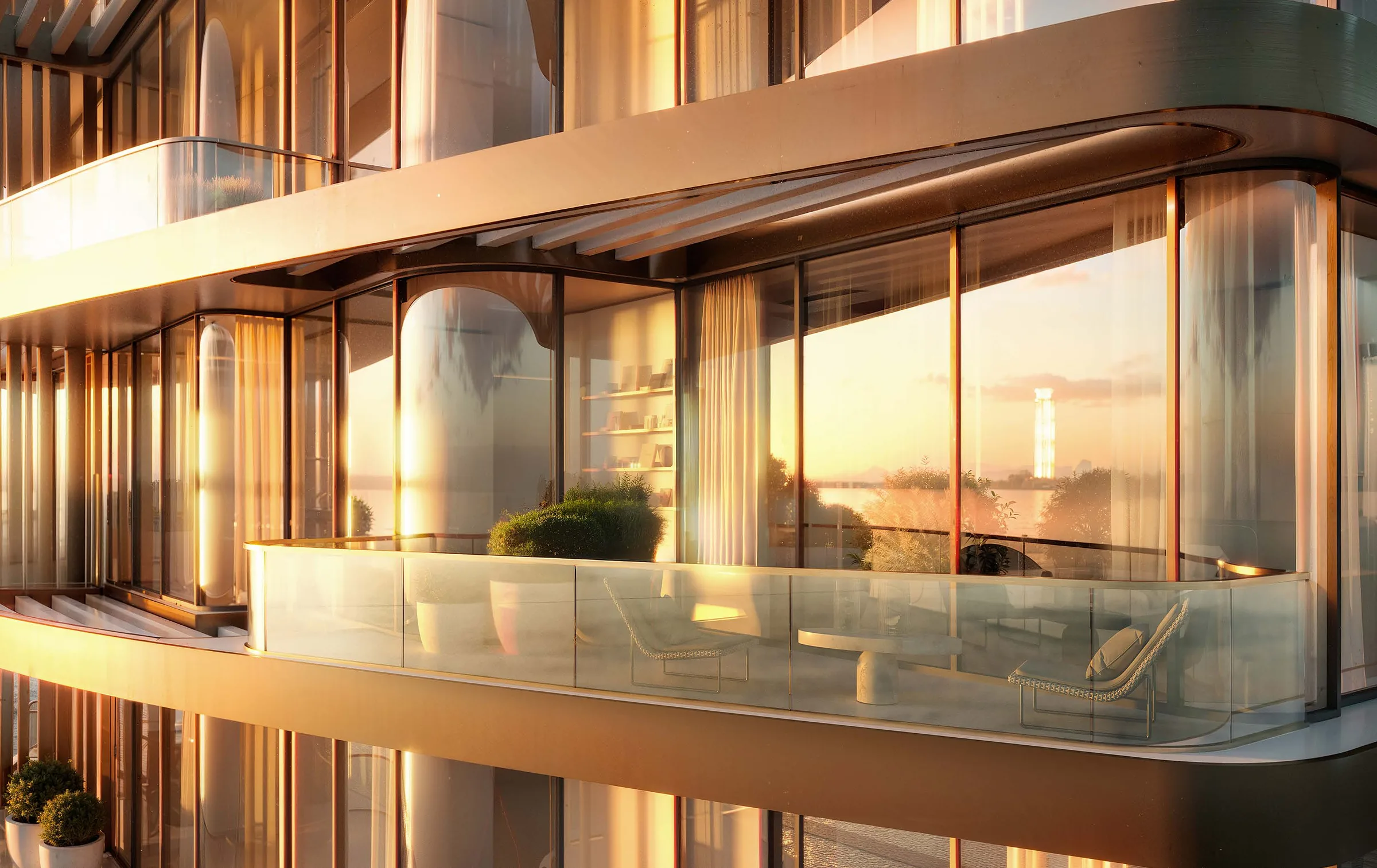 Закруглённая терраса Isla Private Residences в закатном свете