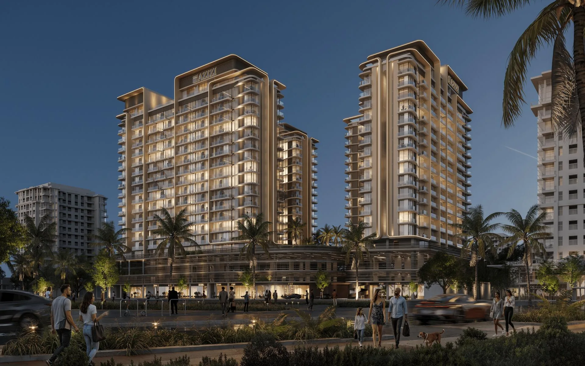 Корпуса Jaddaf Beach Oasis вечером, светятся окна и подиум