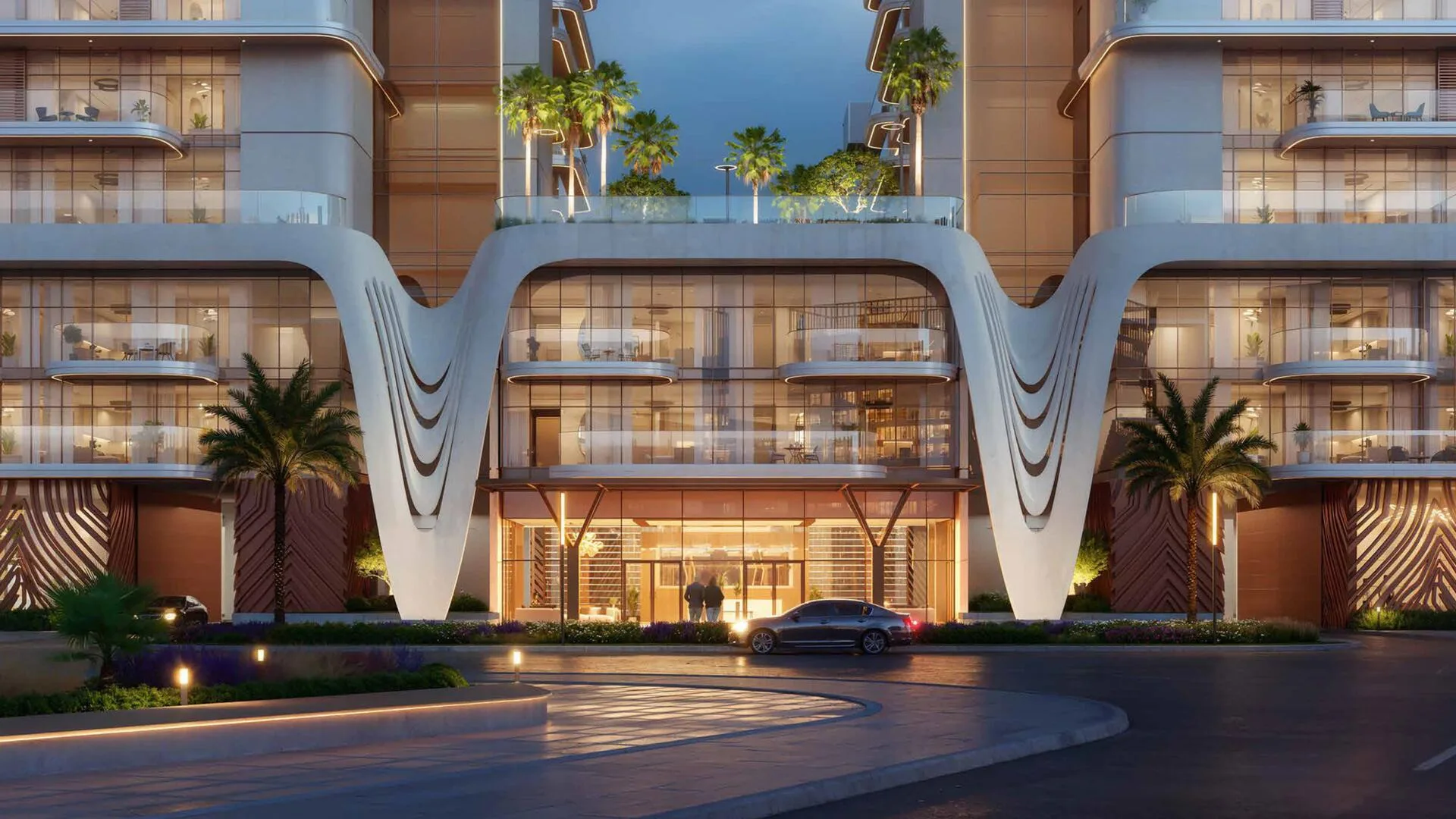 Подъезд к Kaia Residences вечером