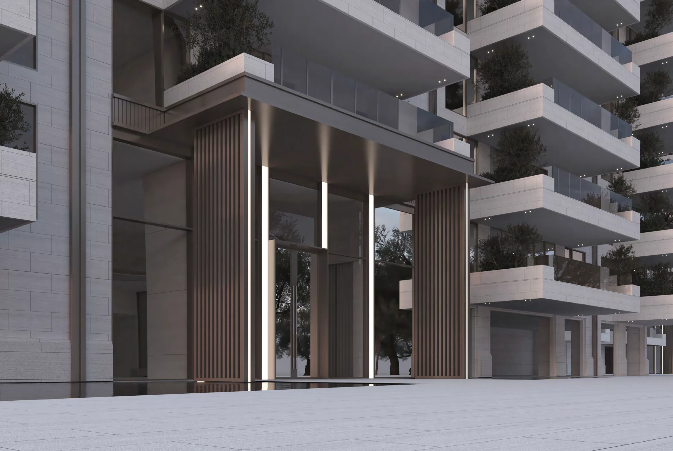 Вход в корпус Keturah Reserve: светлый камень и бронзовые ламели
