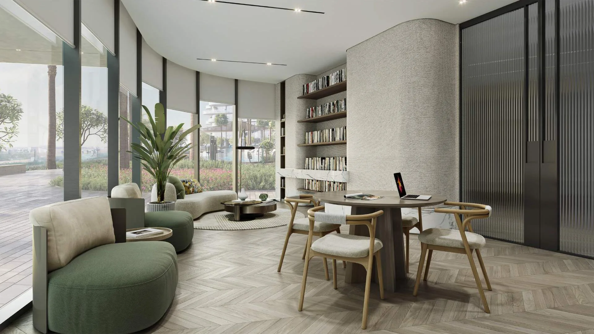 Гостиная с рабочим столом и книжными полками в Laguna Residence