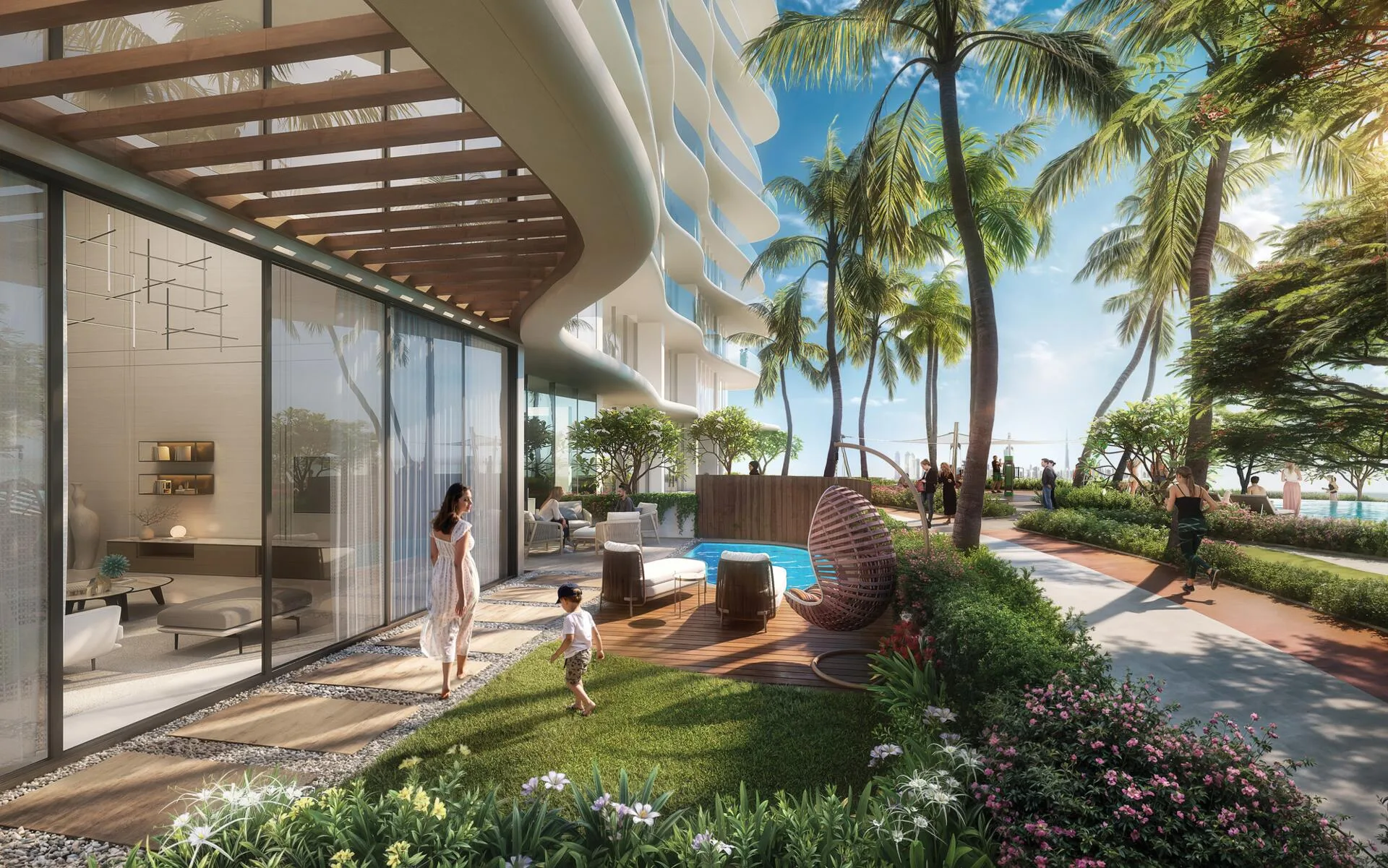 Прогулочная дорожка среди газонов и пальм у Laguna Residence