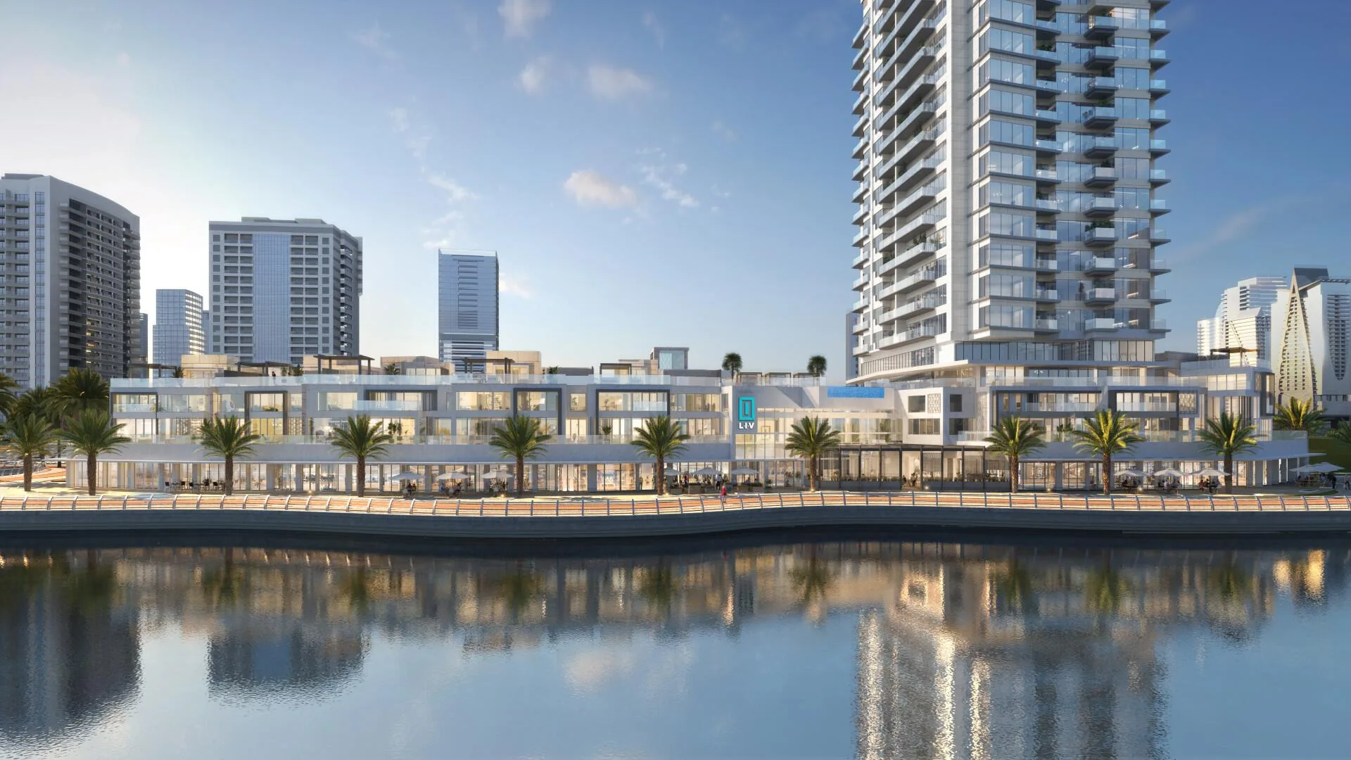 Набережная LIV Waterside с пальмами и кафе у воды