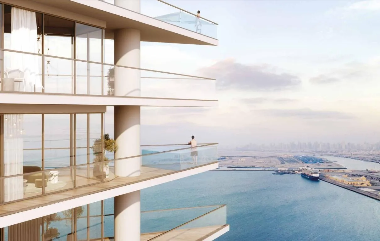 Glass balconies above the bay overlooking Port Rashid and the city