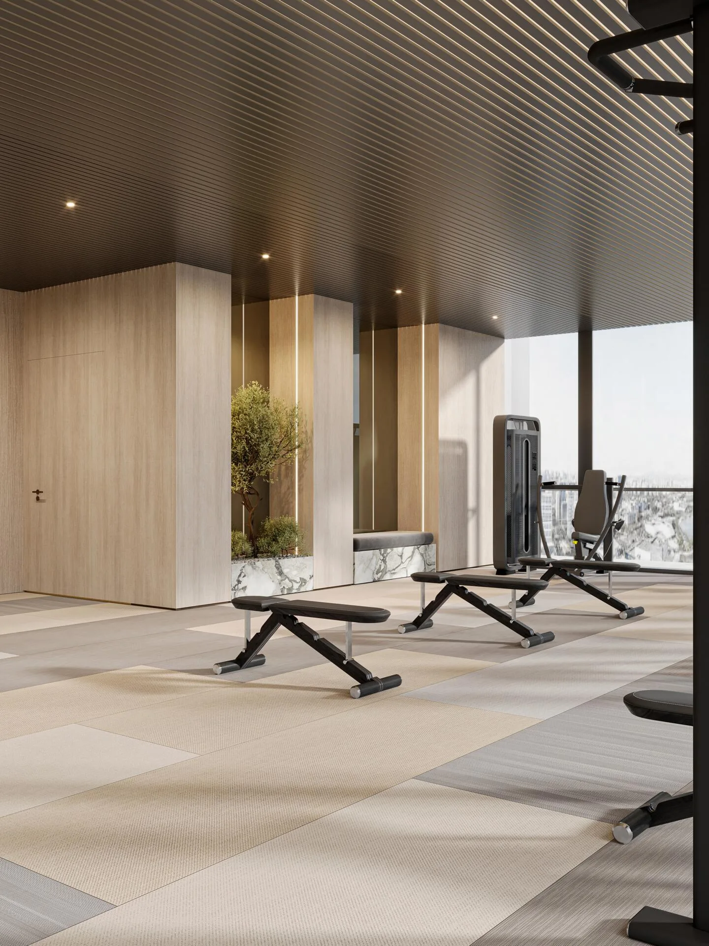 Скамьи и тренажёры в спортзале Mayfair Gardens