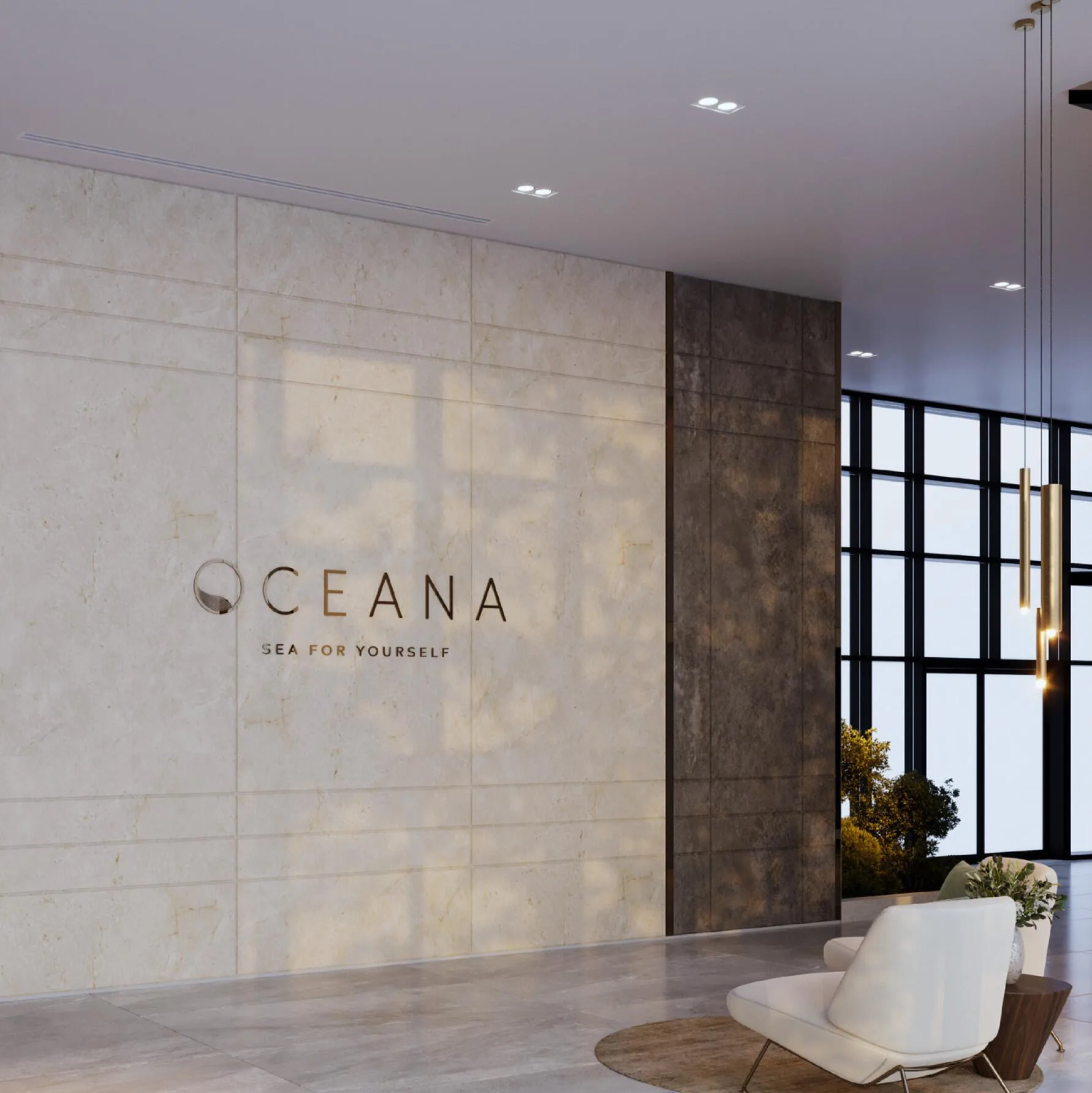 Лобби Oceana: светлый камень и кресло у панорамного окна