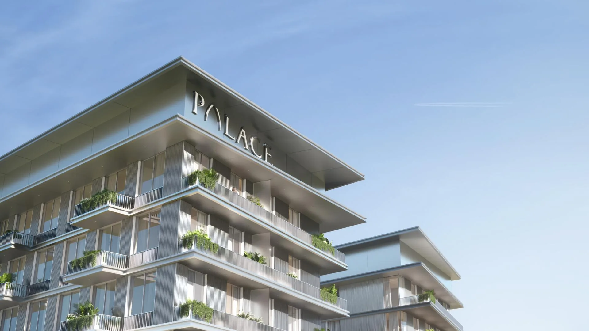 Верх фасада Palace Residences Al Mamsha со знаком PALACE
