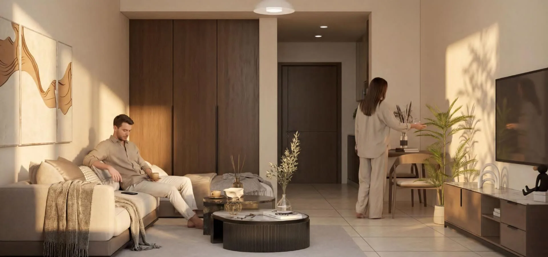Гостиная в квартире Pearl Beach View: диван, шкафы и тёплый свет