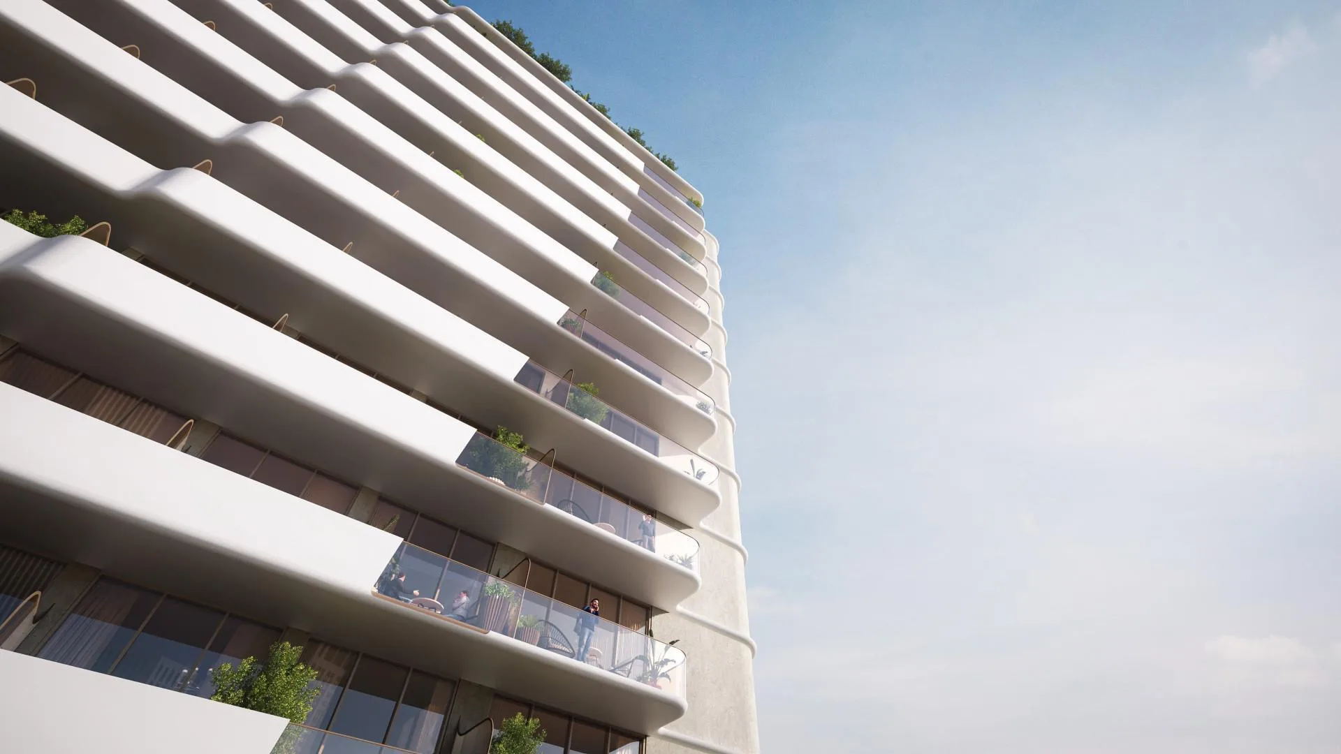 Волнистые балконы Pearl House II снизу на фоне неба